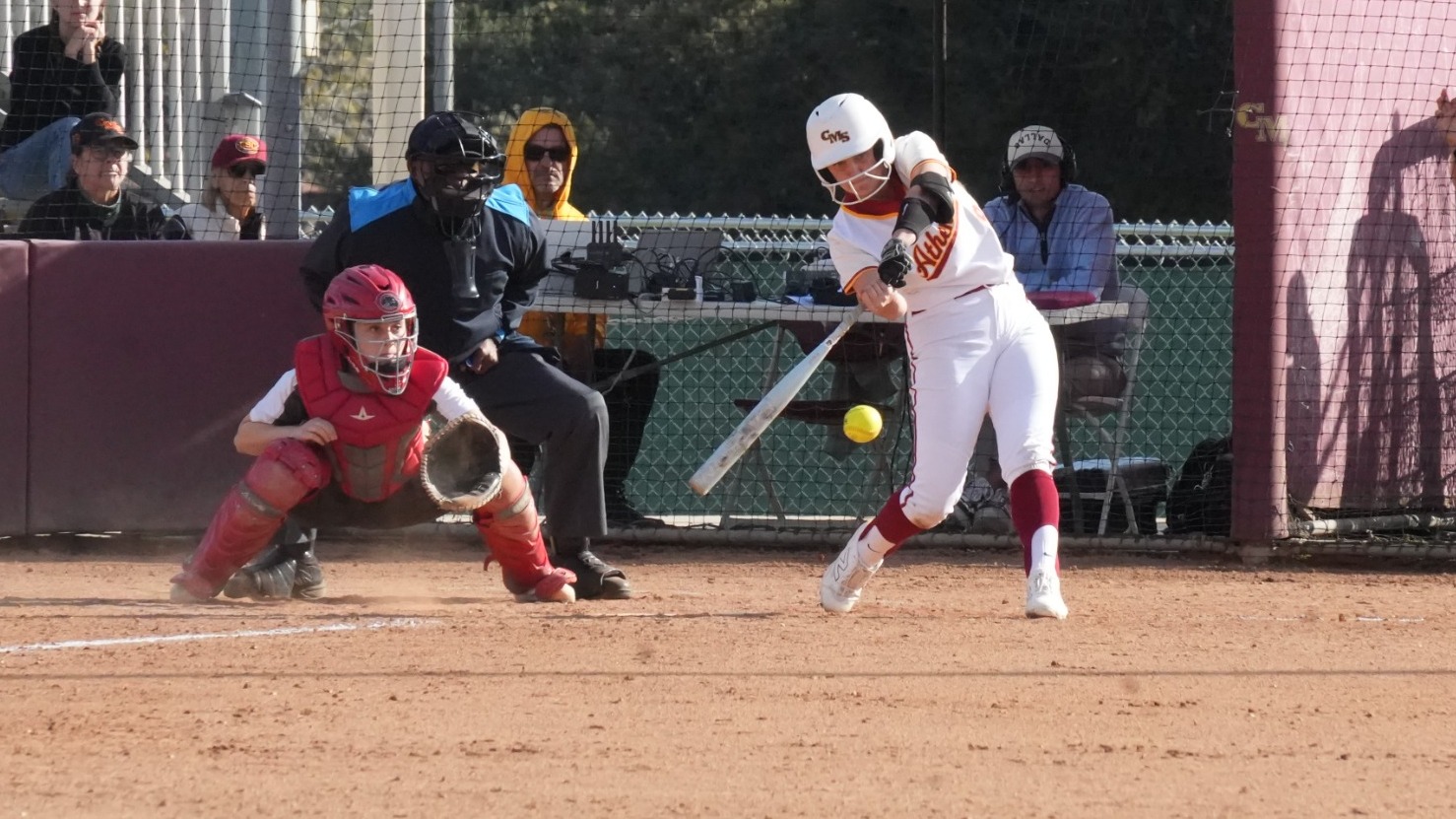 Gaby Robel hitting an RBI single