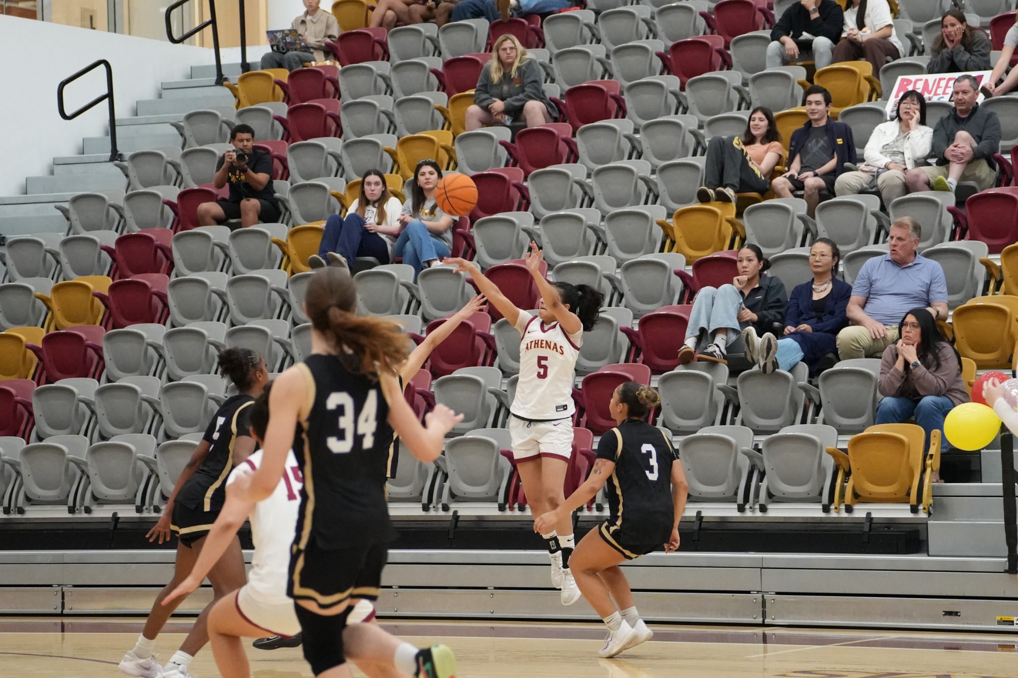 Tanya Ghai shooting a three-pointer