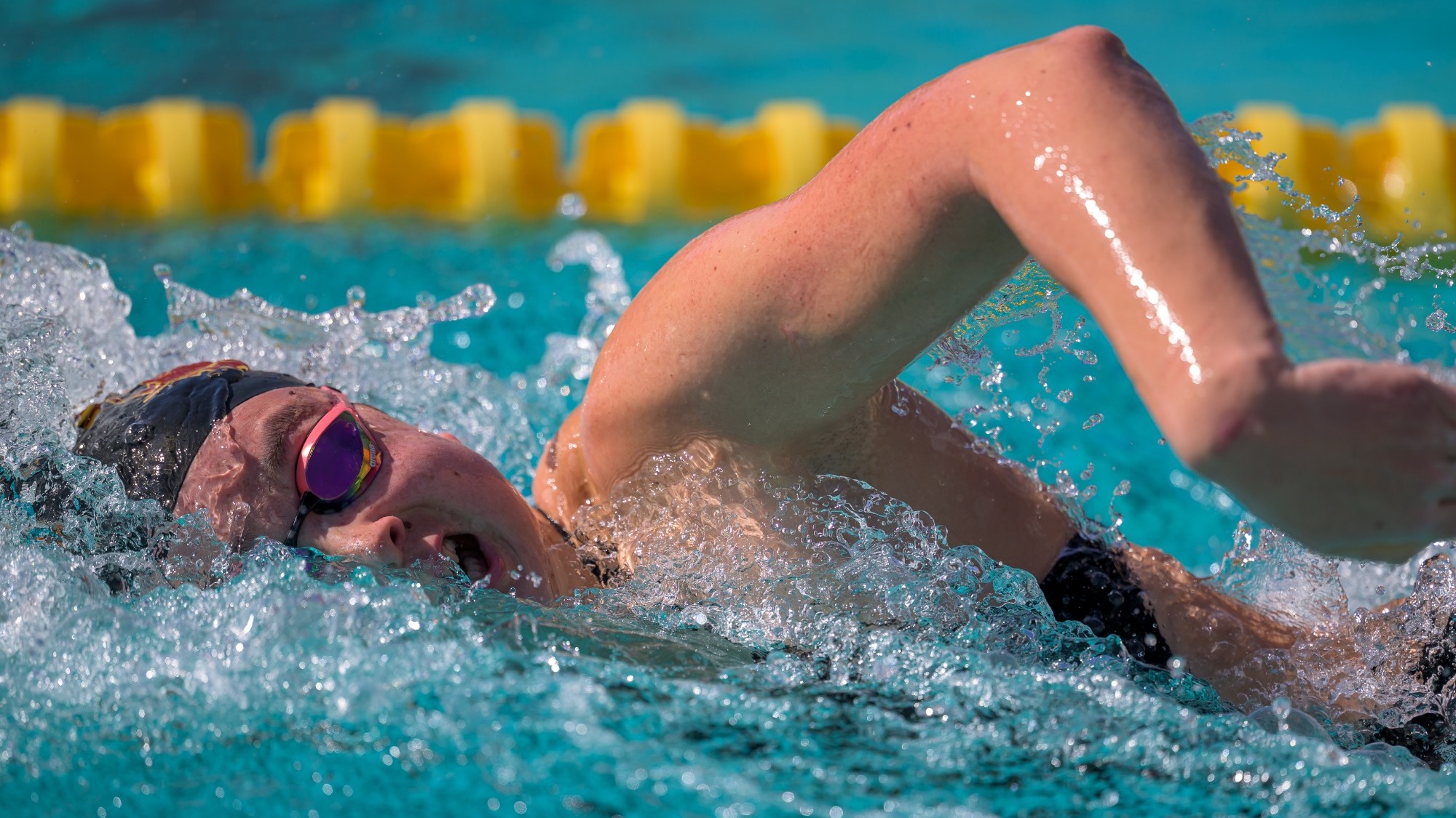 Madeleine Kan swimming the freestyle