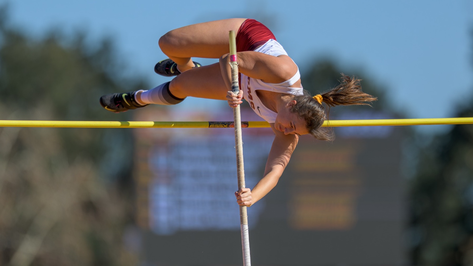 Madeline Seifert clearing the pole vault