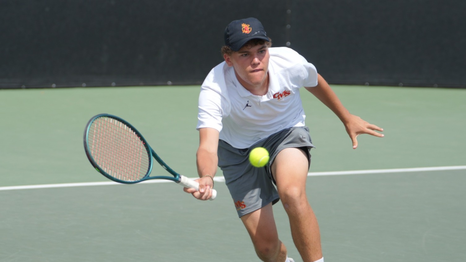 Henry Wilson making a volley