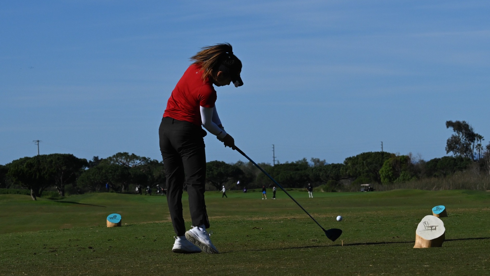 Ella Chiu hitting a tee shot