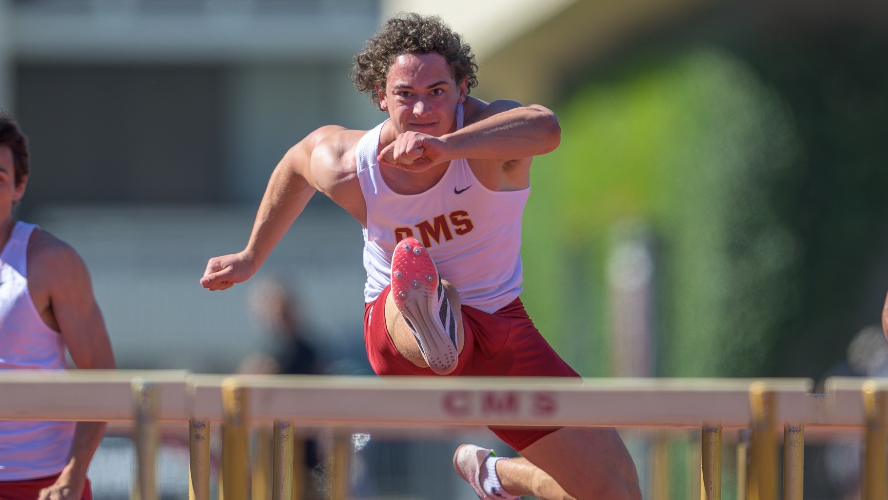 Evan Siegel in the high hurdles