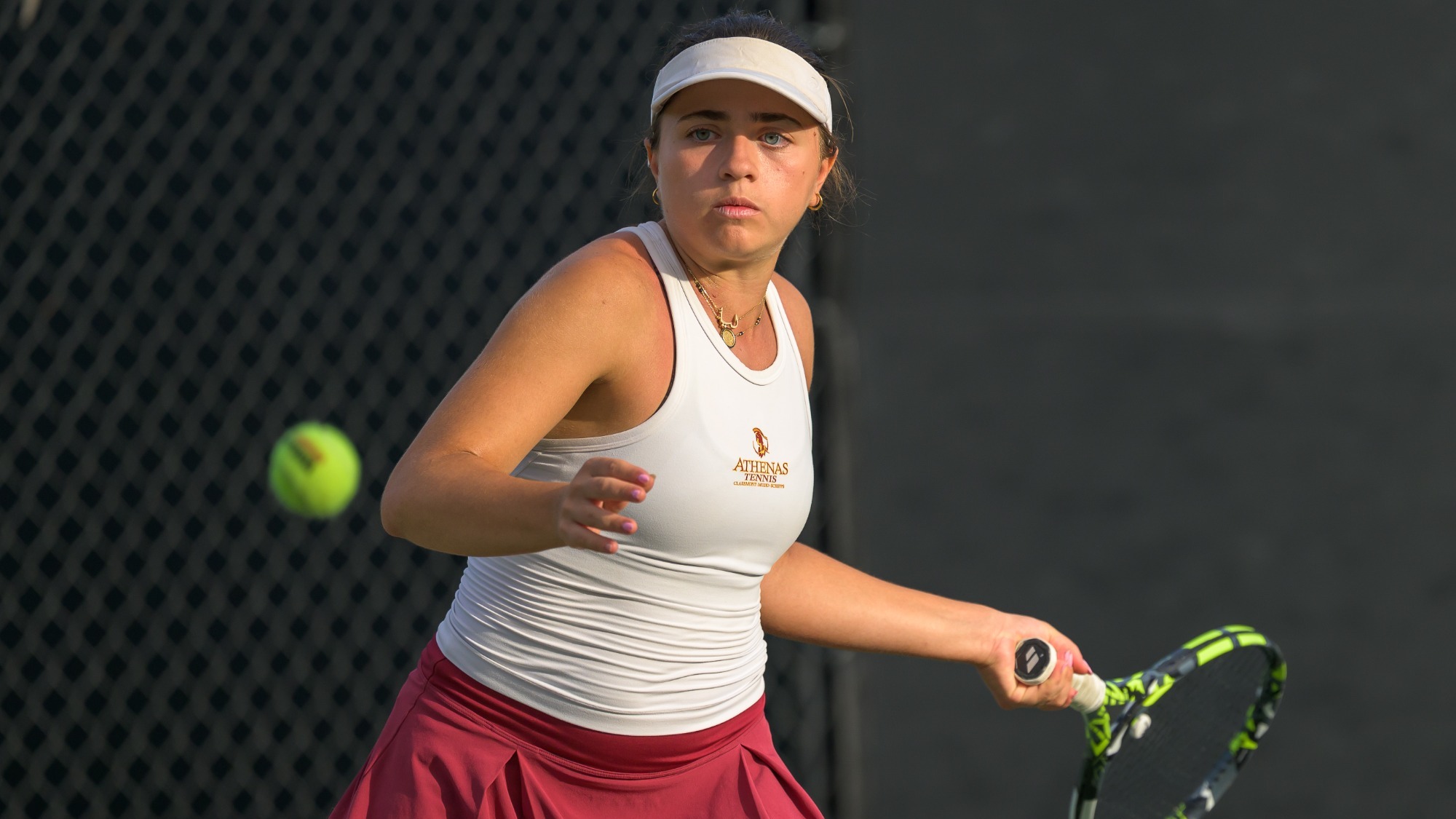 Leah Baroudi preparing to hit a forehand