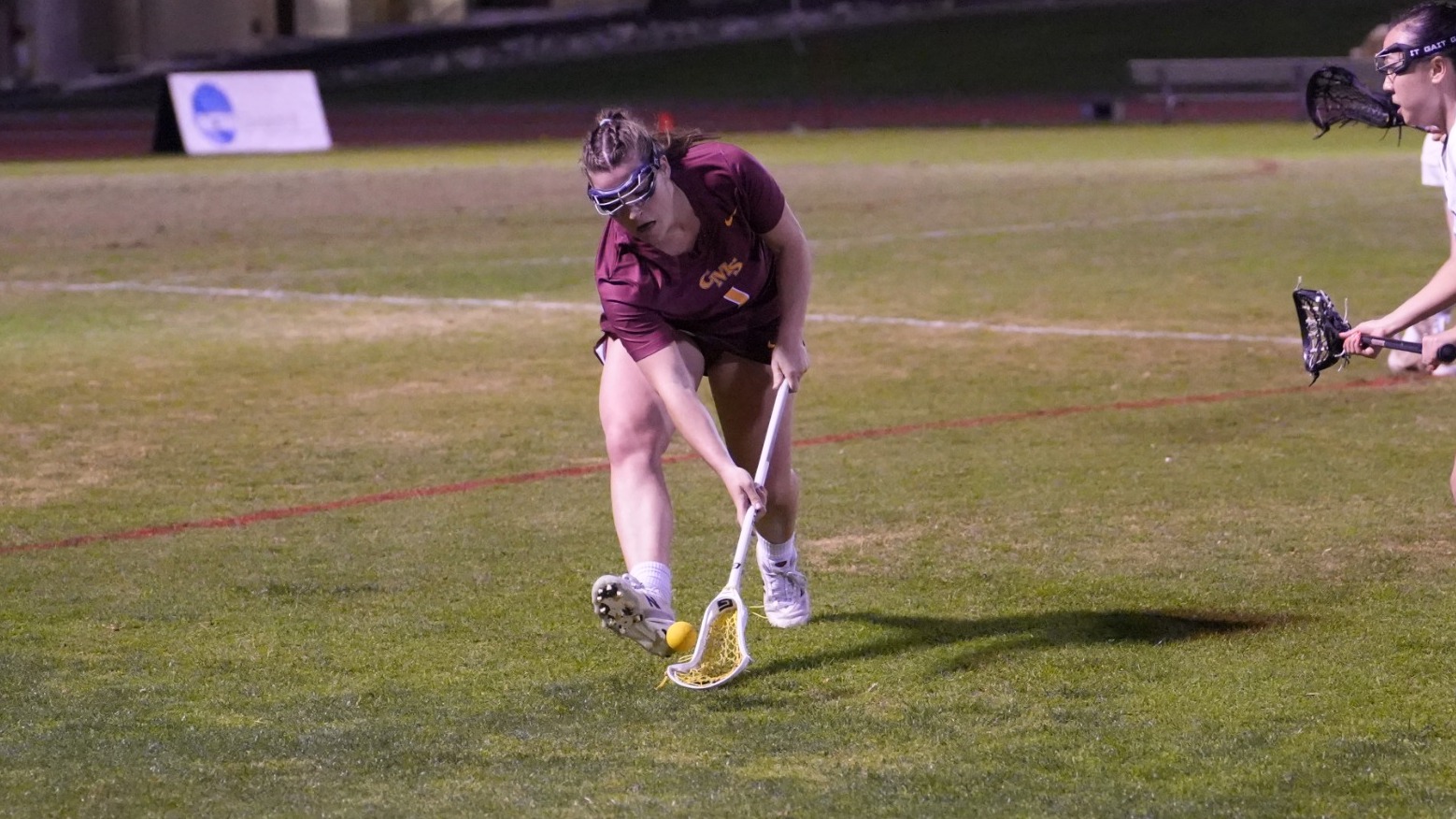 Kate Risse picking up a ground ball