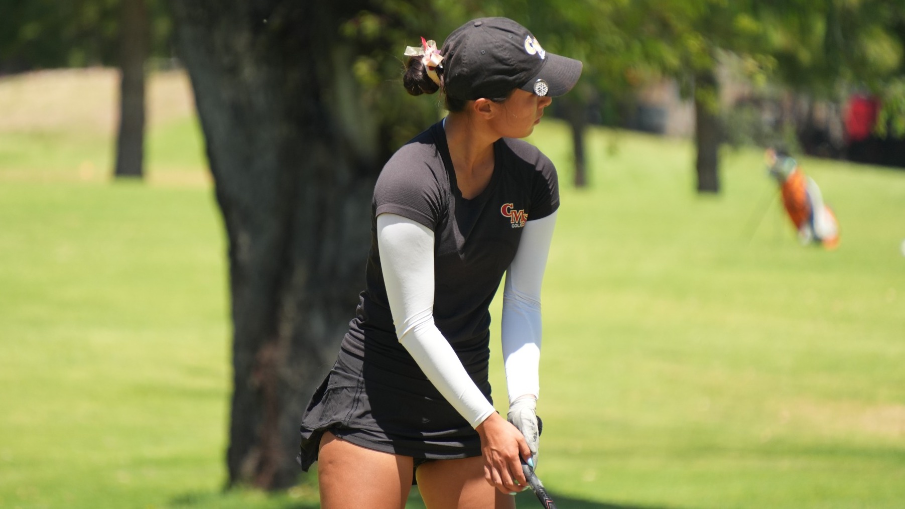 Alisa Ching getting ready to tee off