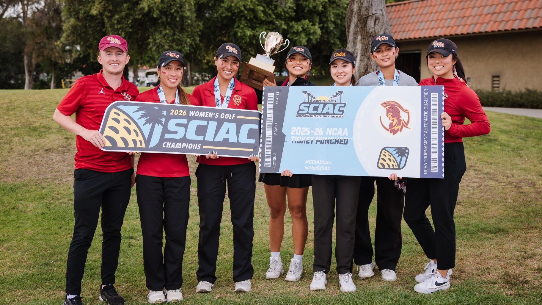 CMS Women's Golf celebrating with SCIAC trophy and banners
