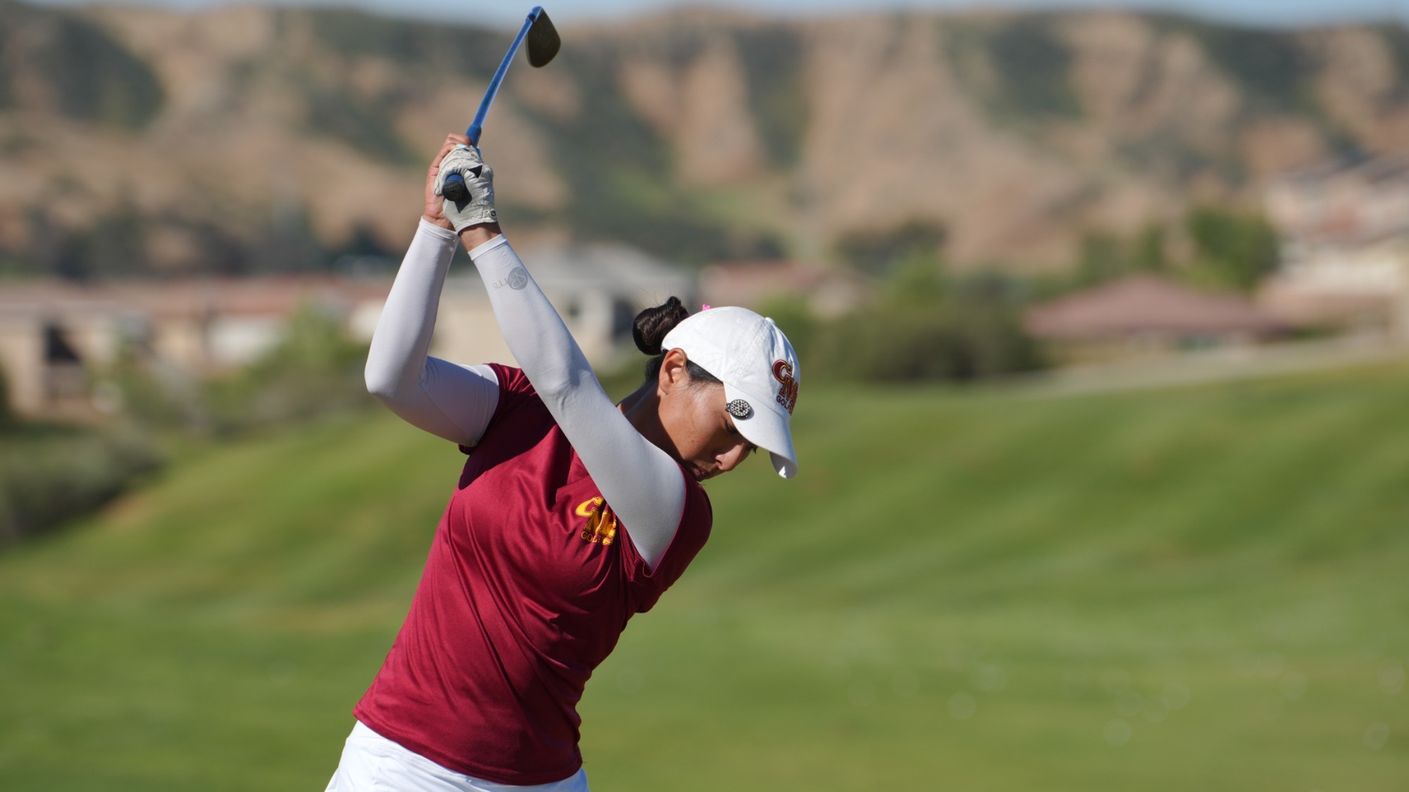 Alisa Ching hitting a tee shot