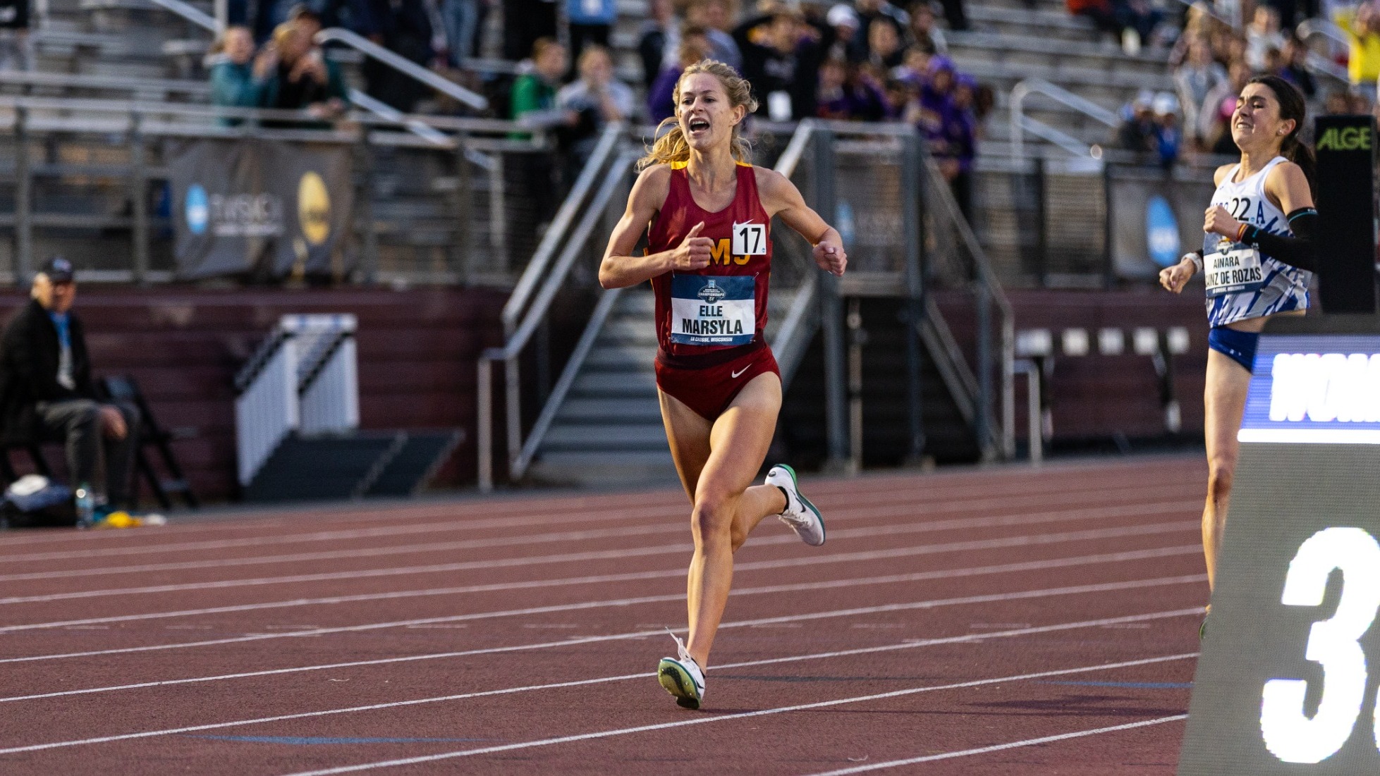 Elle Marsyla crossing the finish line