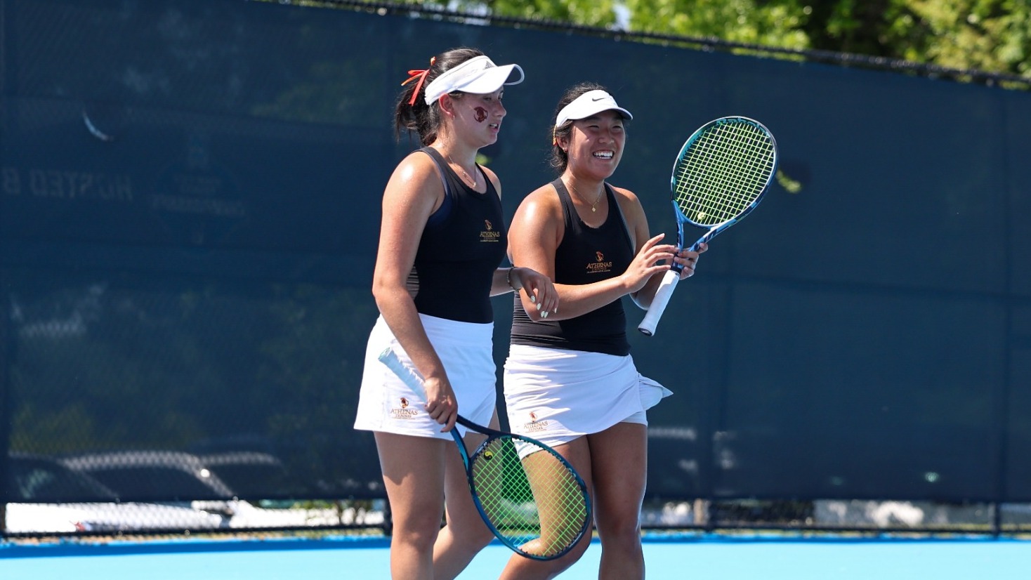 Lindsay Eisenman and Rebecca Kong after a doubles win