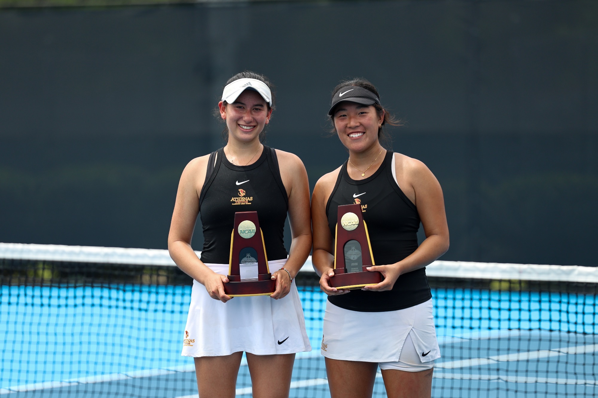 Kong and Eisenman with their first place trophies