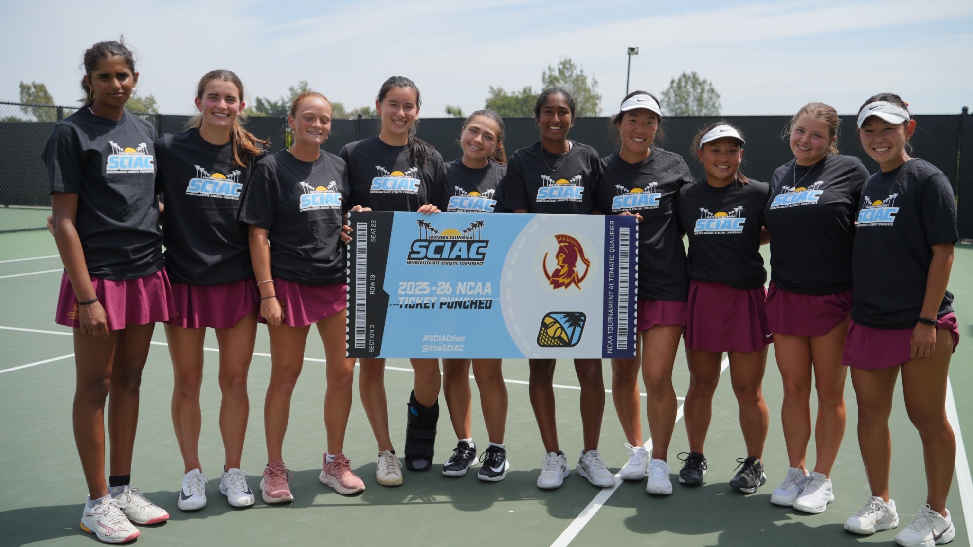 CMS Women's Tennis team photo with the SCIAC banner