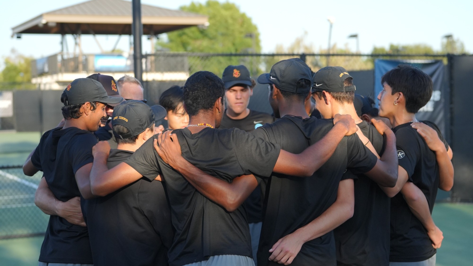 CMS Men's Tennis huddle