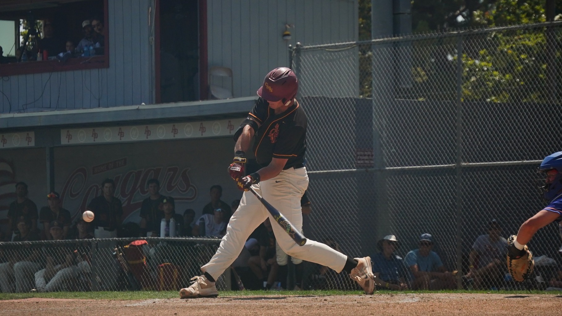 Alex Henderson hitting a homer