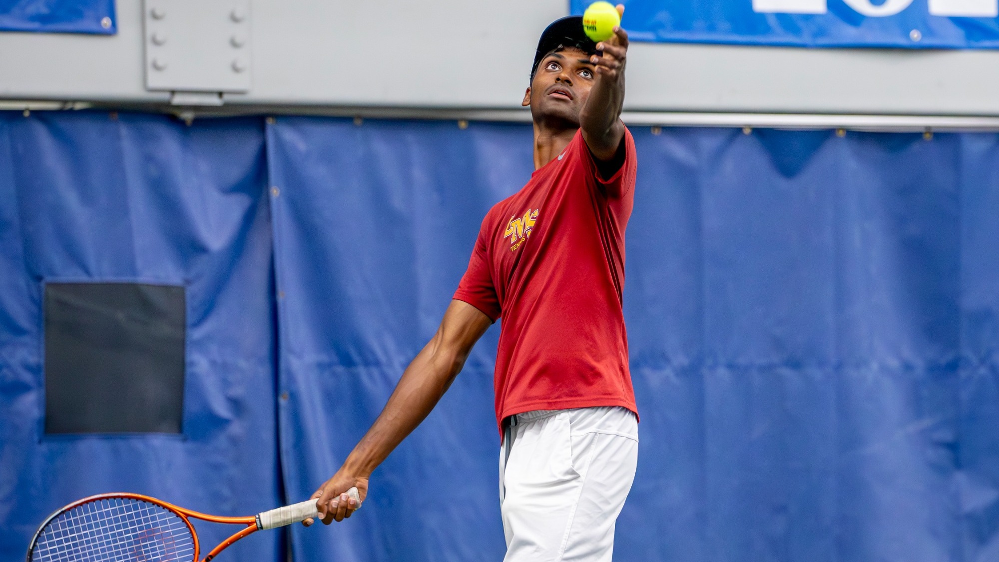 Advik Mareedu serving