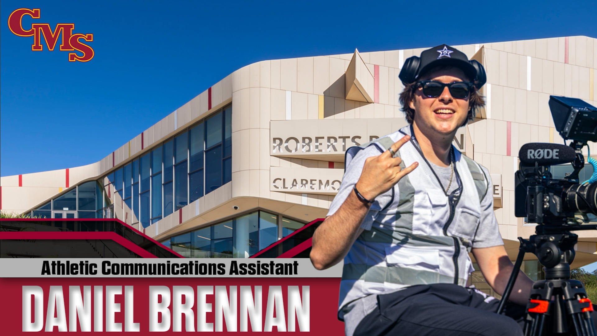 Daniel Brennan head shot with Roberts Pavilion in the background