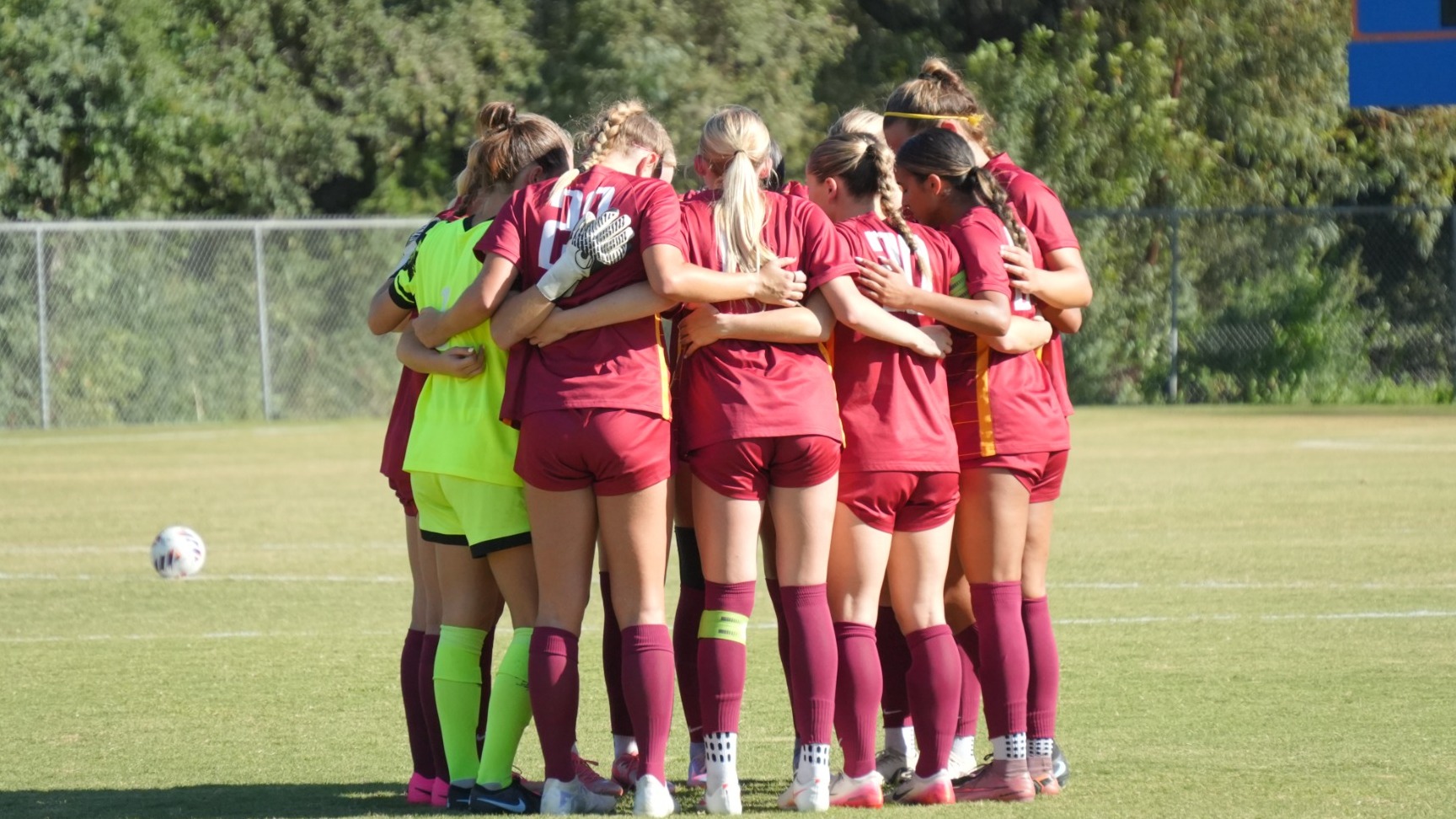 Athenas Soccer huddle