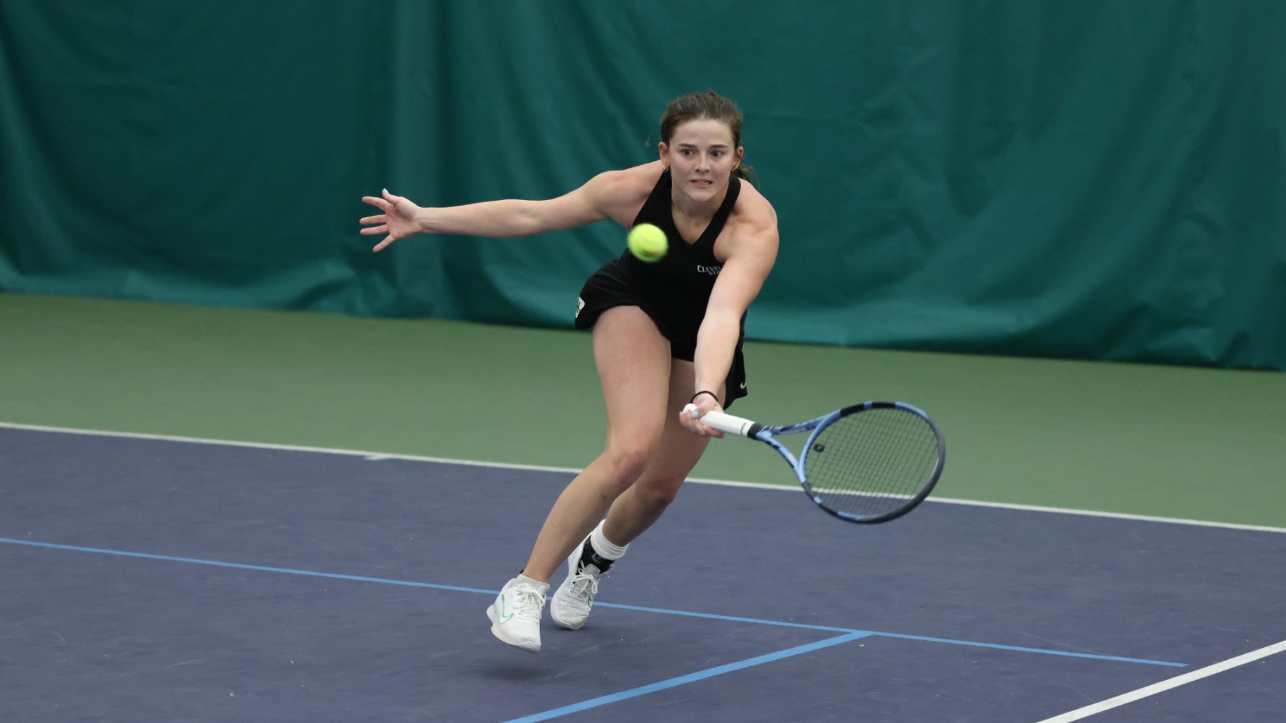 Ella Franz hits a volley at Milwaukee