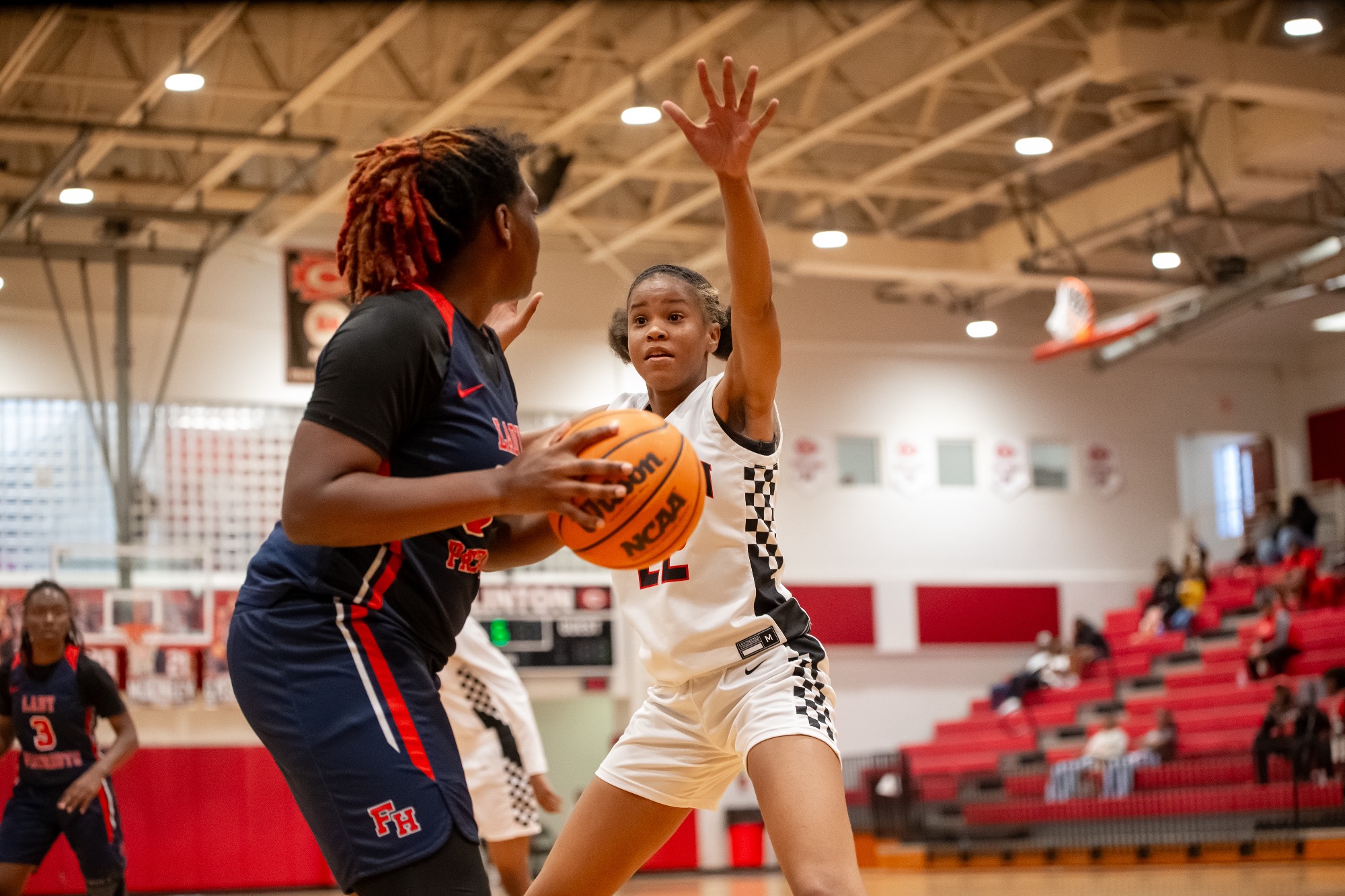 The Lady Arrow Basketball team defeats Forest Hill at Arrow Gym with a 37-24 scoreboard as Caitlin White seals it with the final free throw. 
