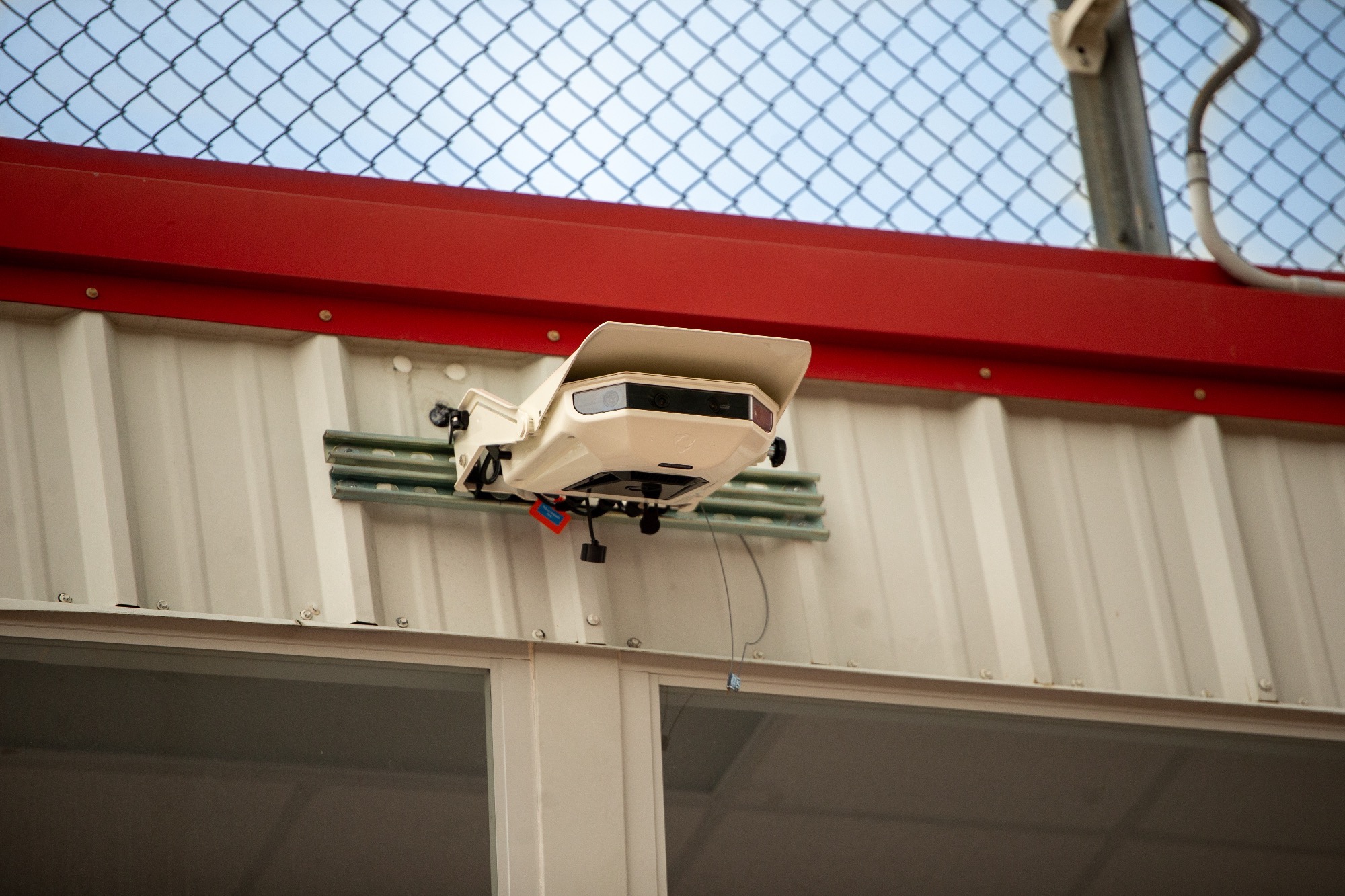 The Hudl Focus Outdoor camera sits atop the Arrow Field press box on the campus of Clinton High School. The camera uses motion-tracking cameras to keep up with the action on the playing surface. Another Hudl Focus camera is located in the Clinton High School gym.