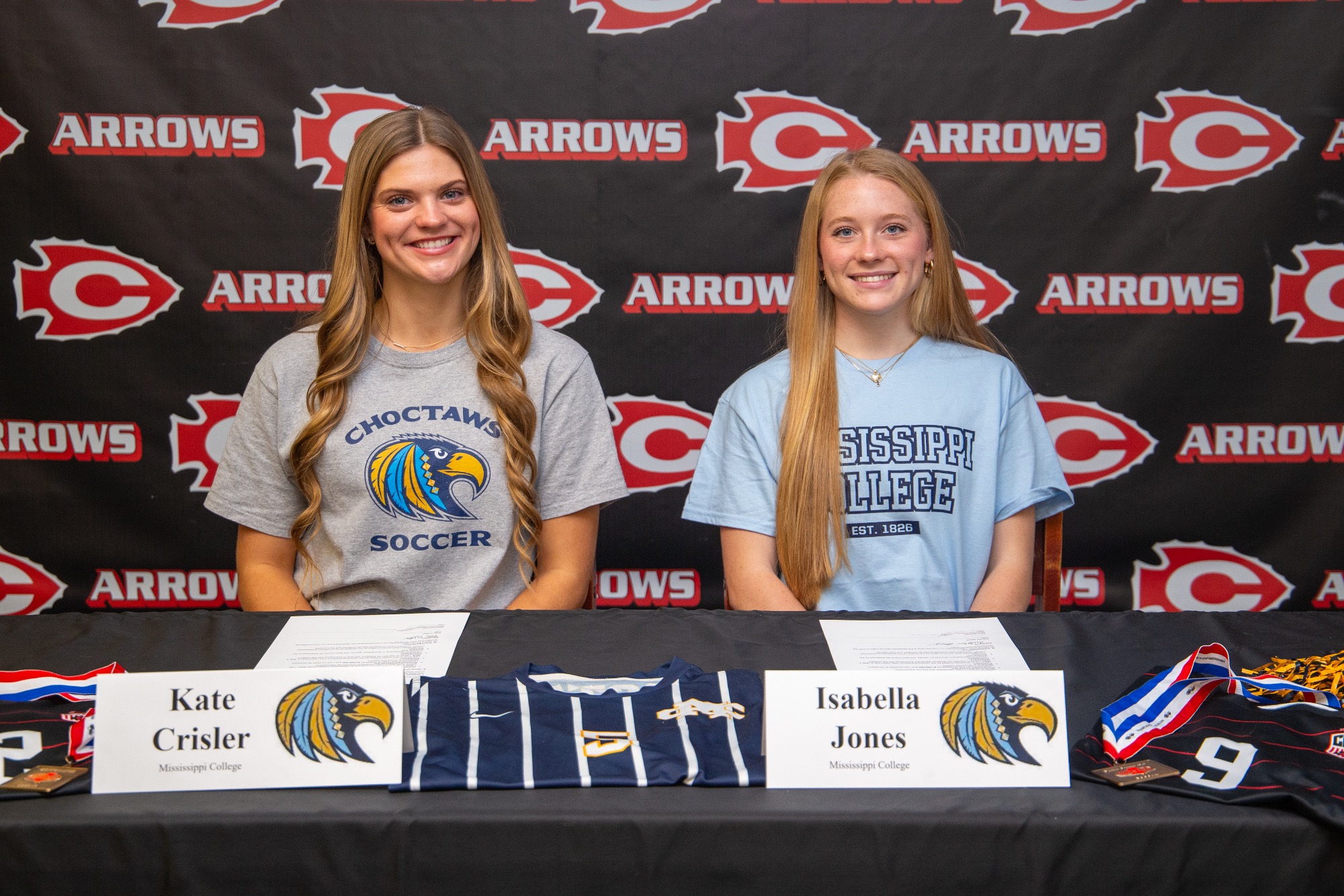 Kate Crisler and Isabella Jones both sign to Mississippi College to play soccer after their high school career. 