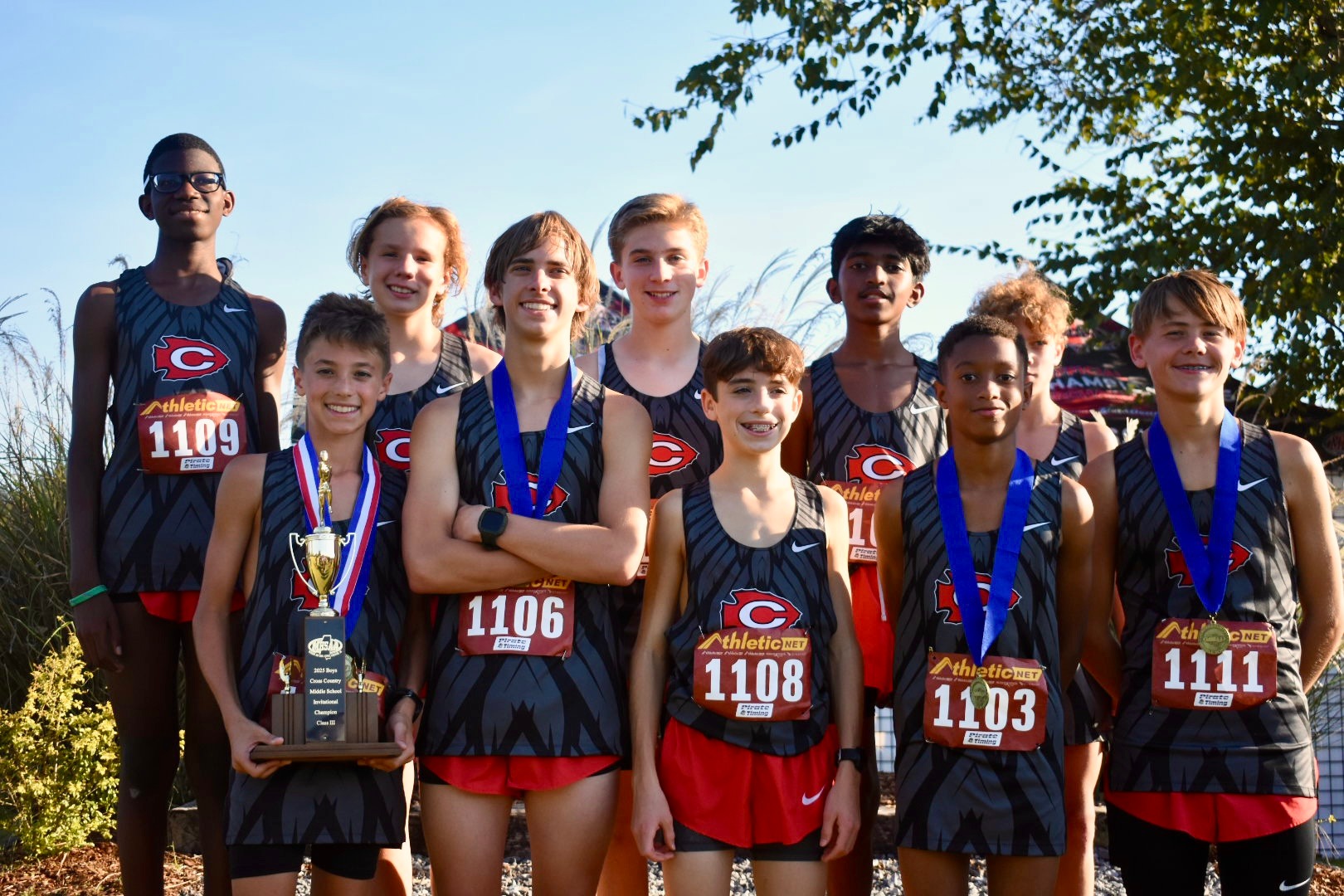 The 2025 CJHS Boys Cross Country team celebrates their championship at the MHSAA Middle School Cross Country Invitational at Choctaw Trails.