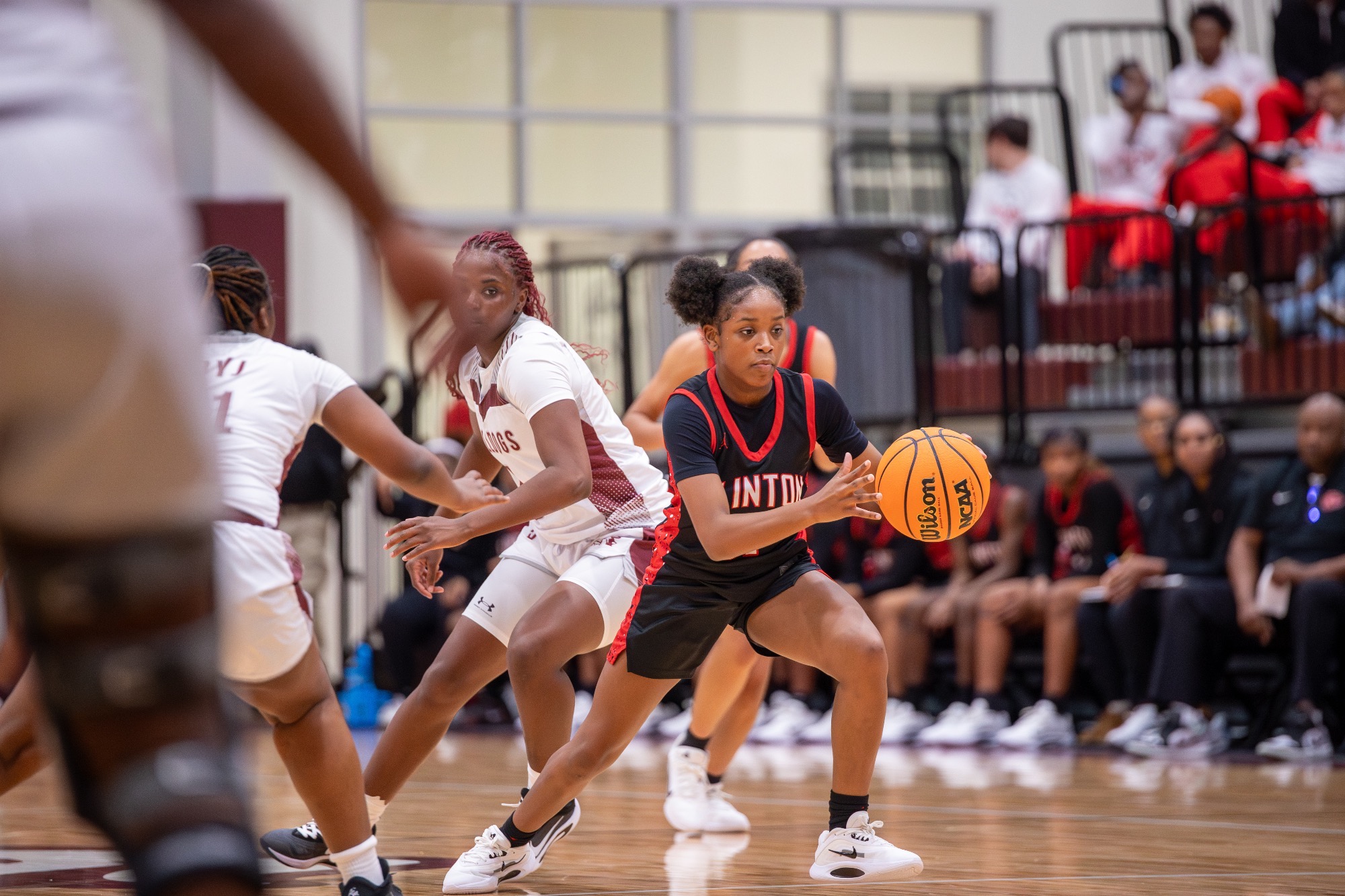A Lady Arrow makes a drive towards the basket against the Terry Bulldogs.