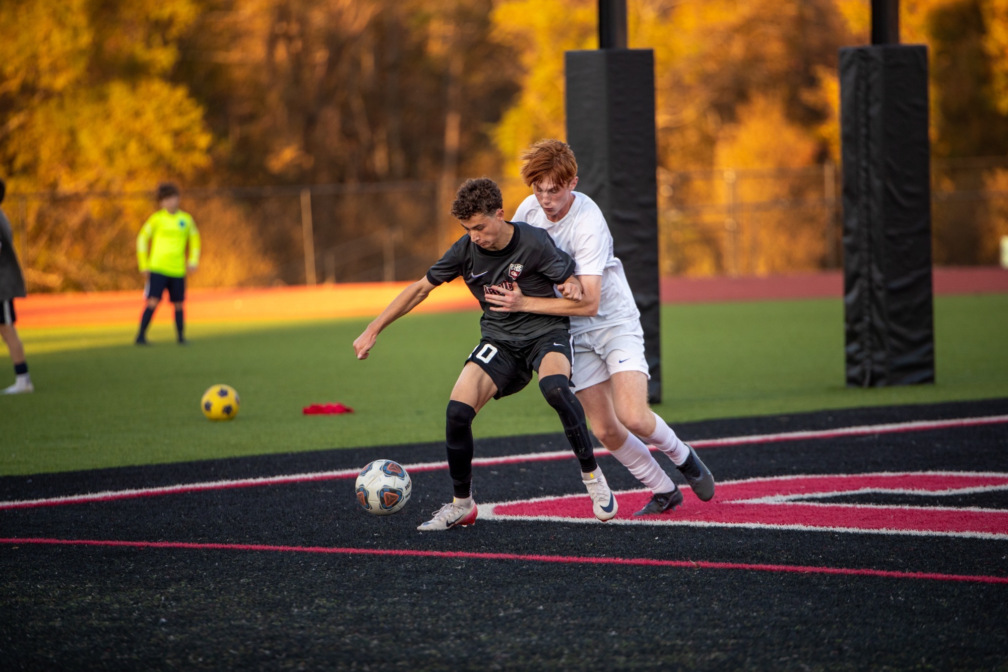 Cole Hayman fights off a Tupelo Golden Wave defender.