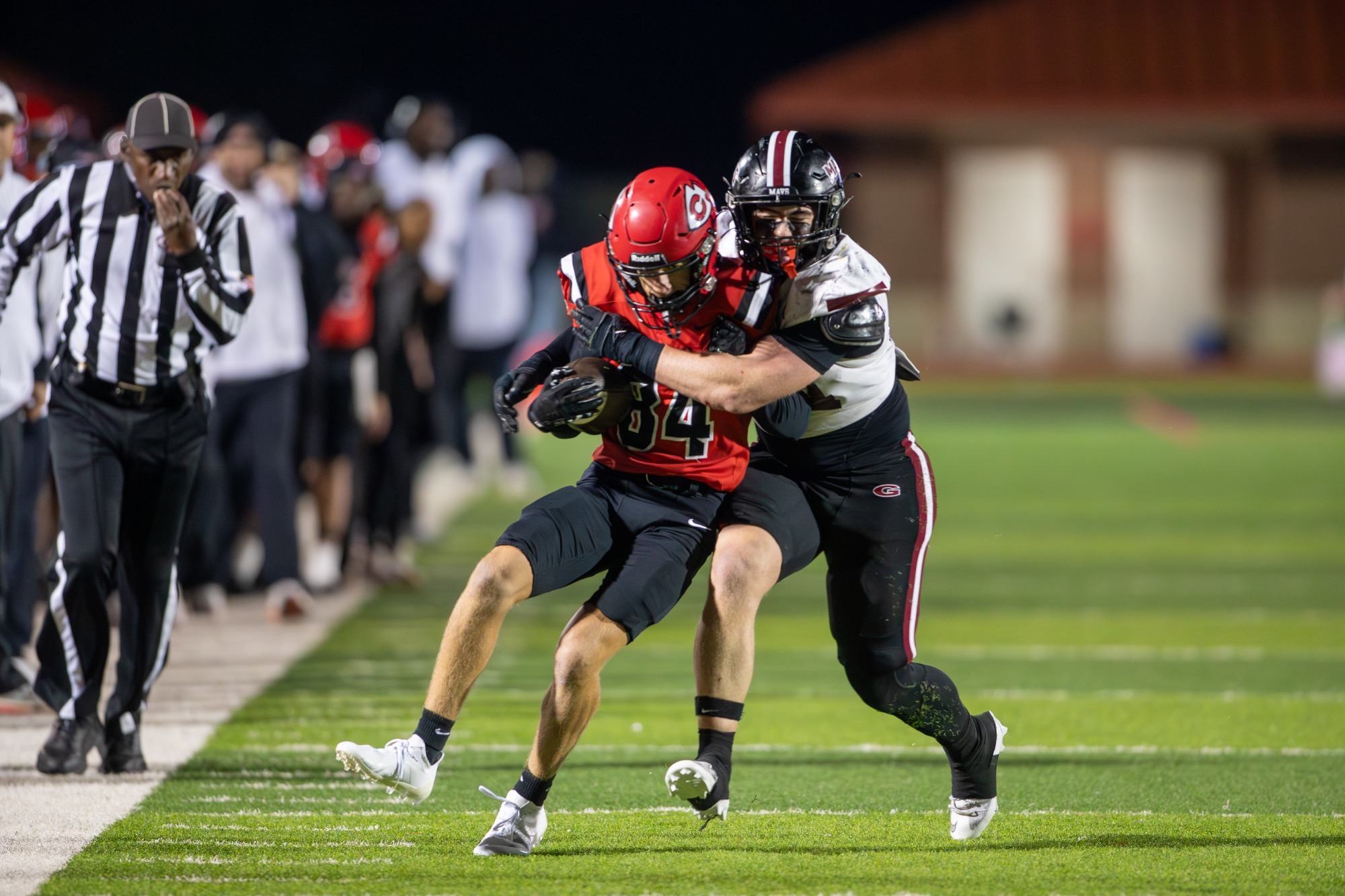 John Jackson attempts to break a Germantown tackle on Friday, October 31, at Arrow Field.
