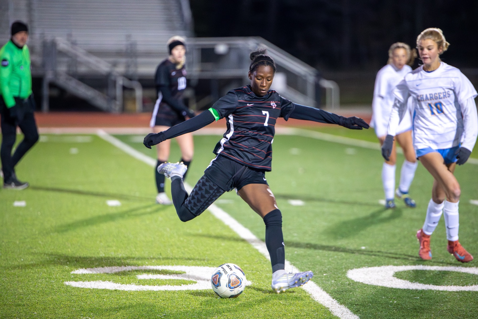 Kayla Jones fires a pass forward against the Oxford Lady Chargers on Tuesday, December 2, at Arrow Field