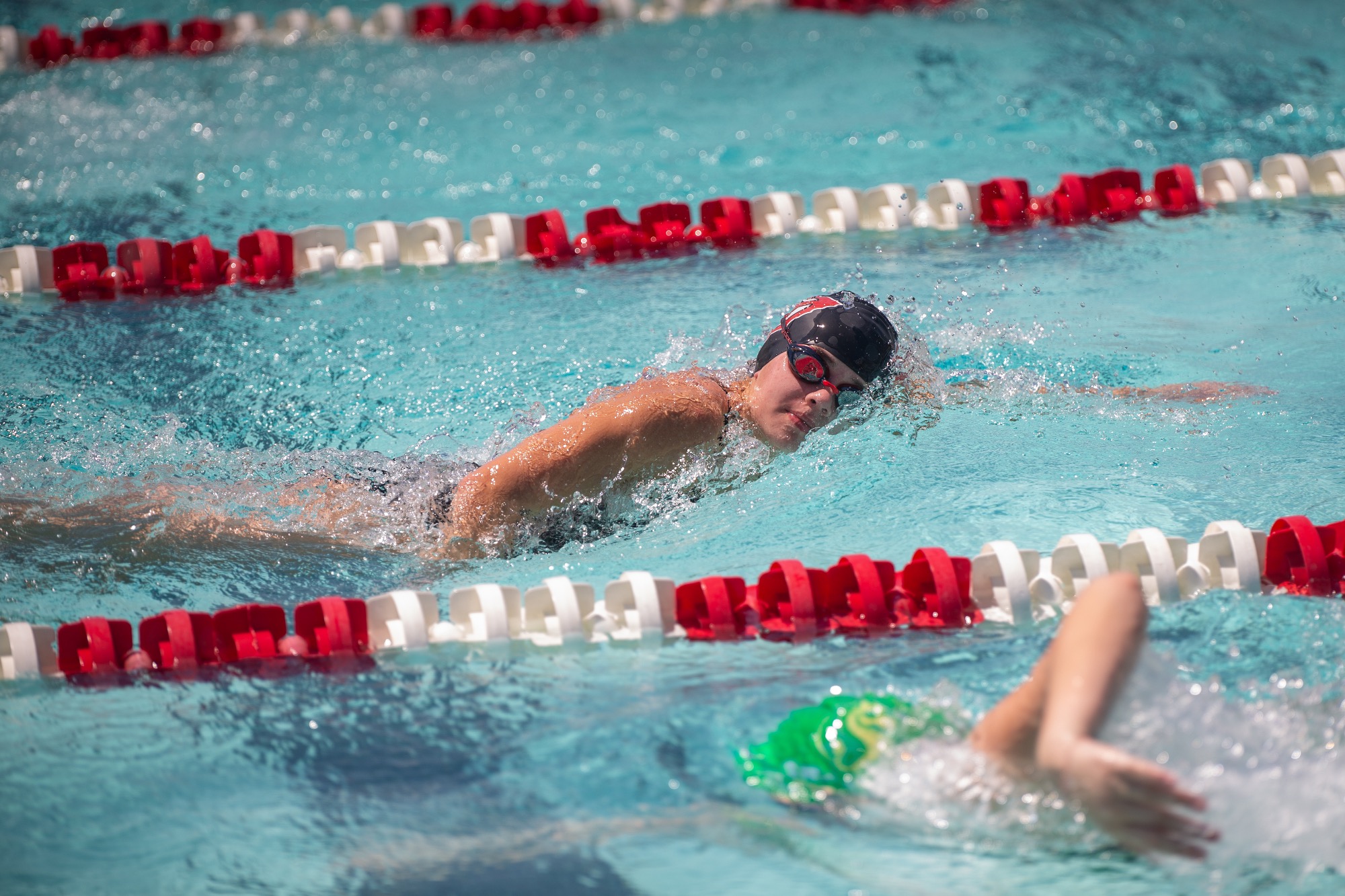 The Clinton Arrow Swimming Team returns to Vicksburg to compete in the Warren Central Invitational. 