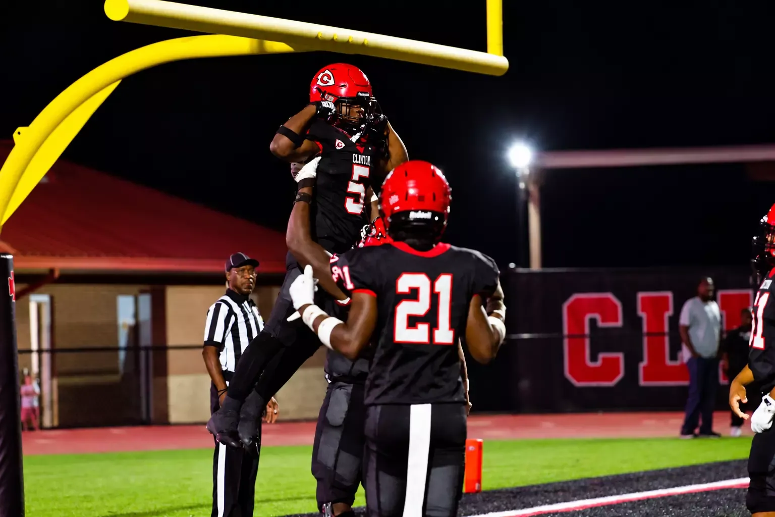 Cayden Albert celebrates his touchdown against Murrah on Friday, Oct. 9, at Arrow Field.