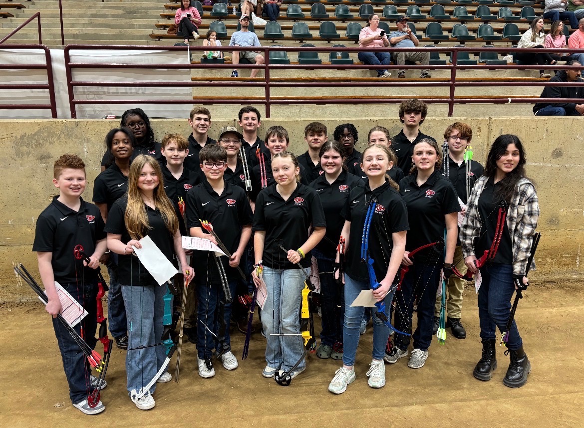 The CJHS Archery team poses for a quick team photo prior to their shooting round at the north state tournament.
