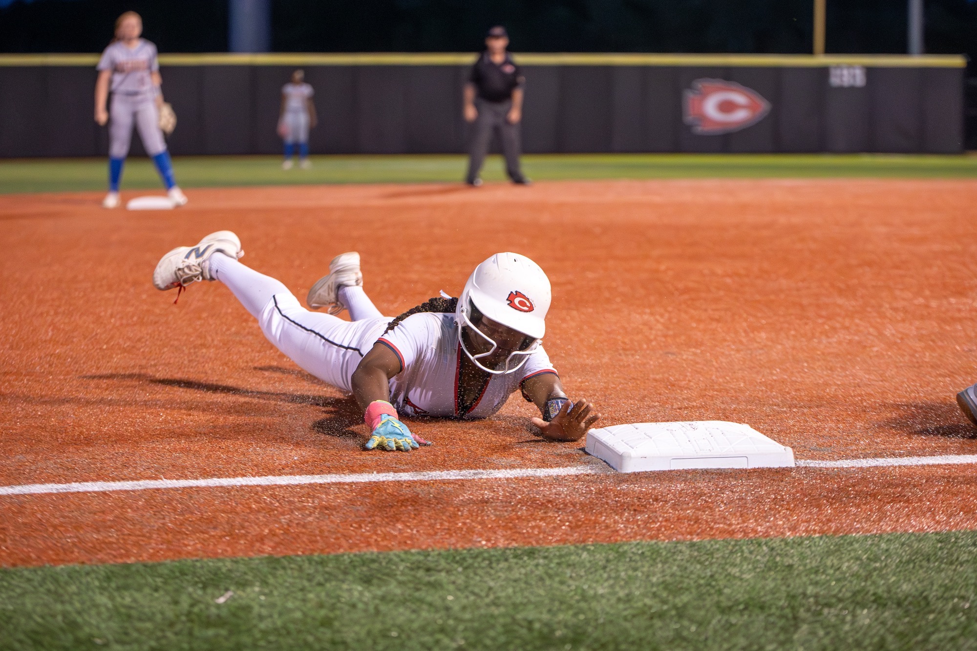 Madison Rhodes slides into third base against the Oxford Chargers at CHS.