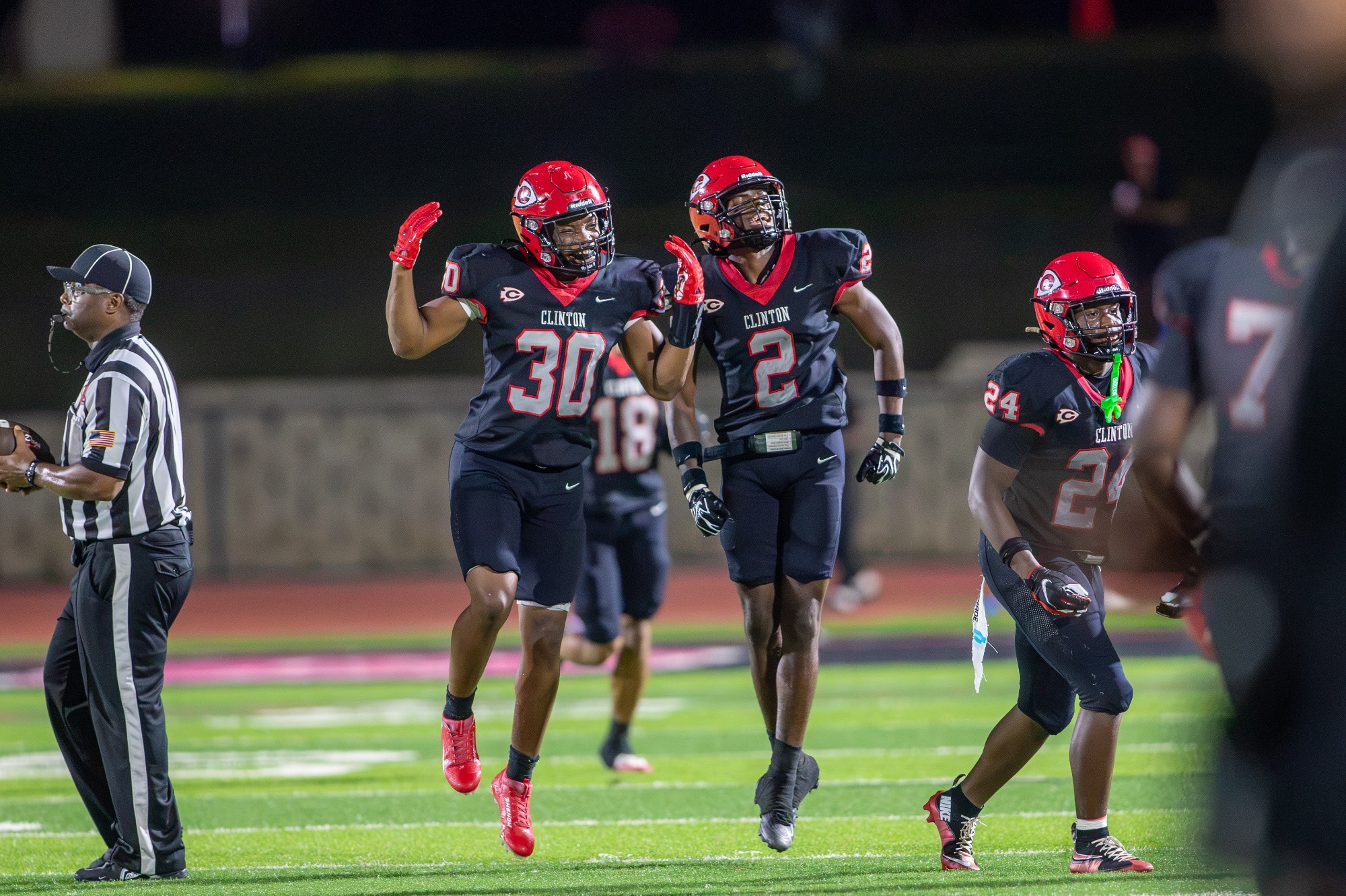 Two Arrows celebrate a defensive stop against the Brandon Bulldogs on Friday, September 11, at Arrow Field.