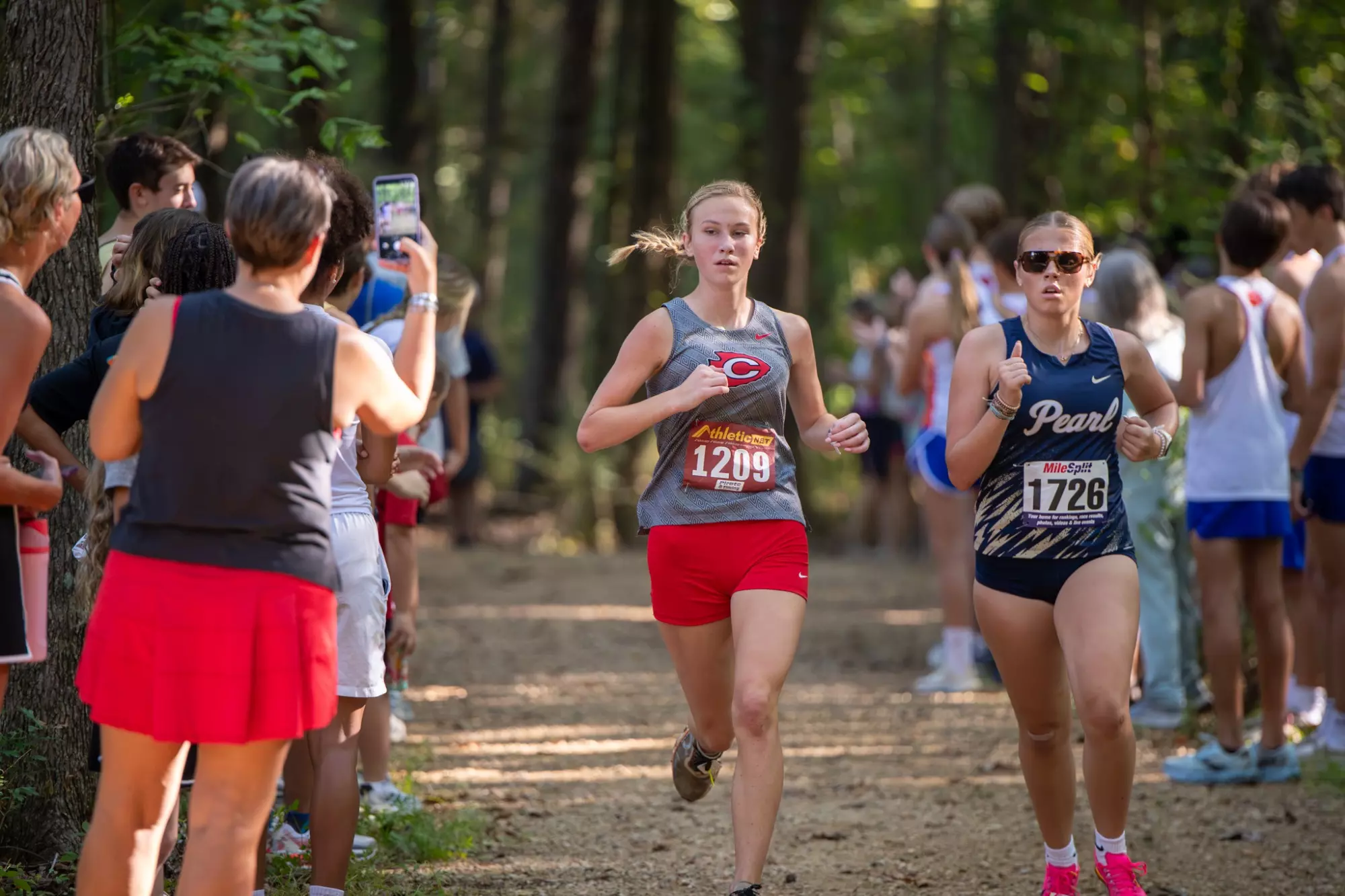 The Clinton High School men's and women's cross country team claimed its first meet victory of the season, winning at the Southern Heatwave Classic on Saturday, August 29, at the City of Brandon Cross Country Trail.