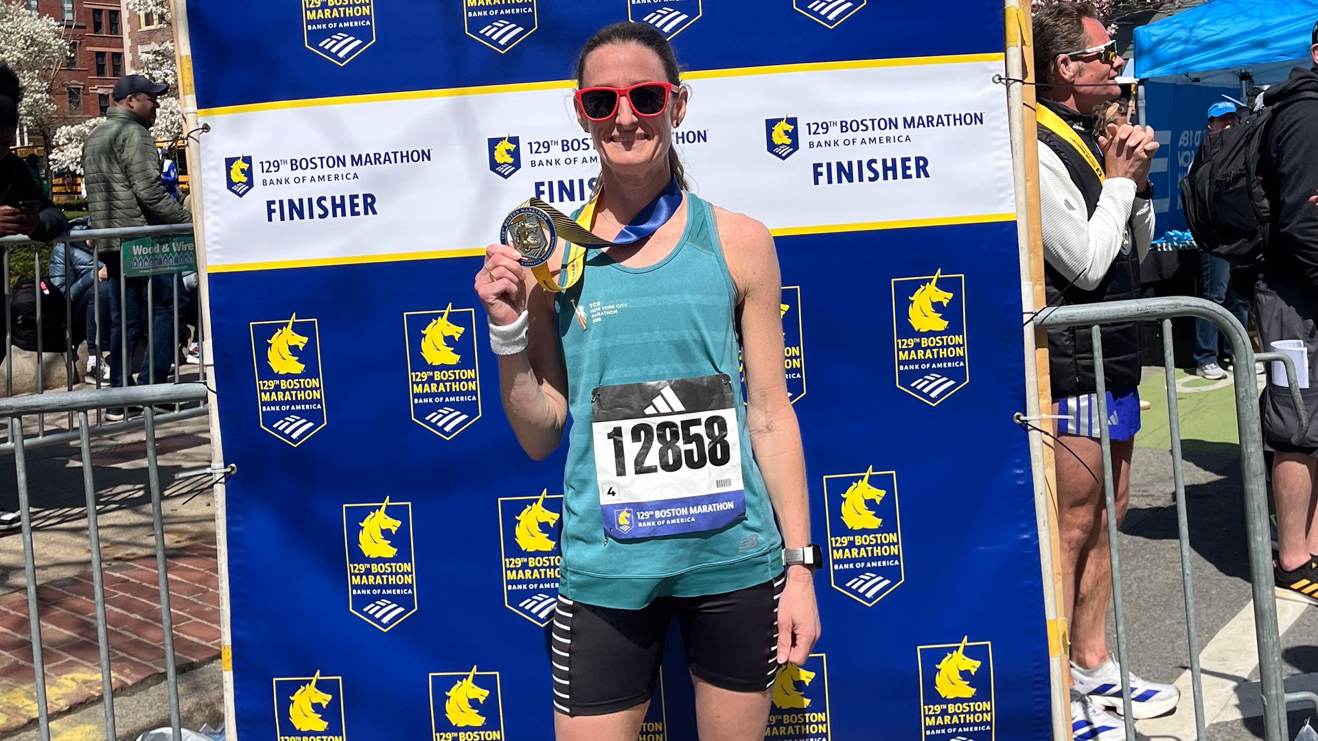 Kate with medal at boston marathon