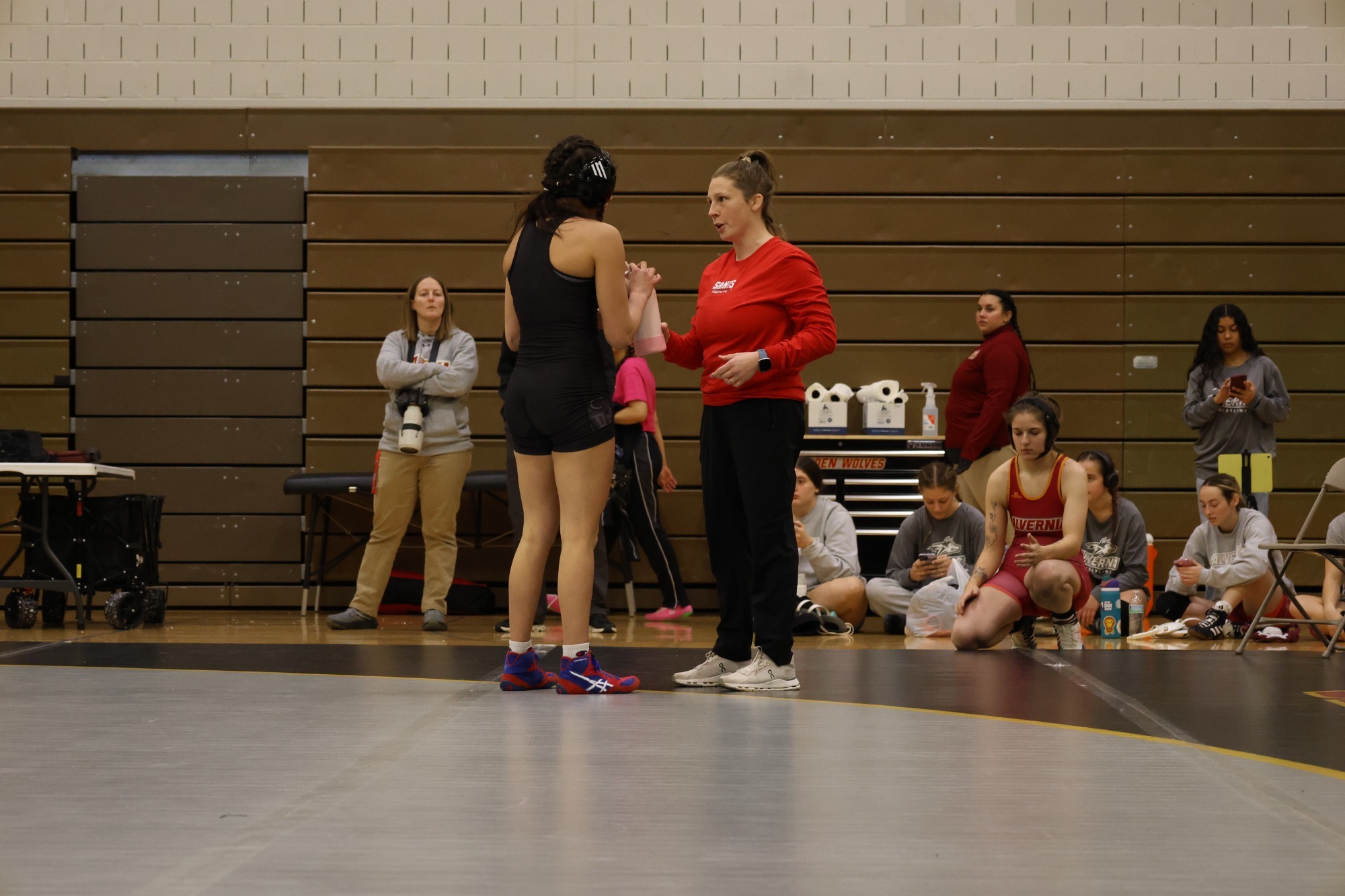 Sluberski addressing a wrestler