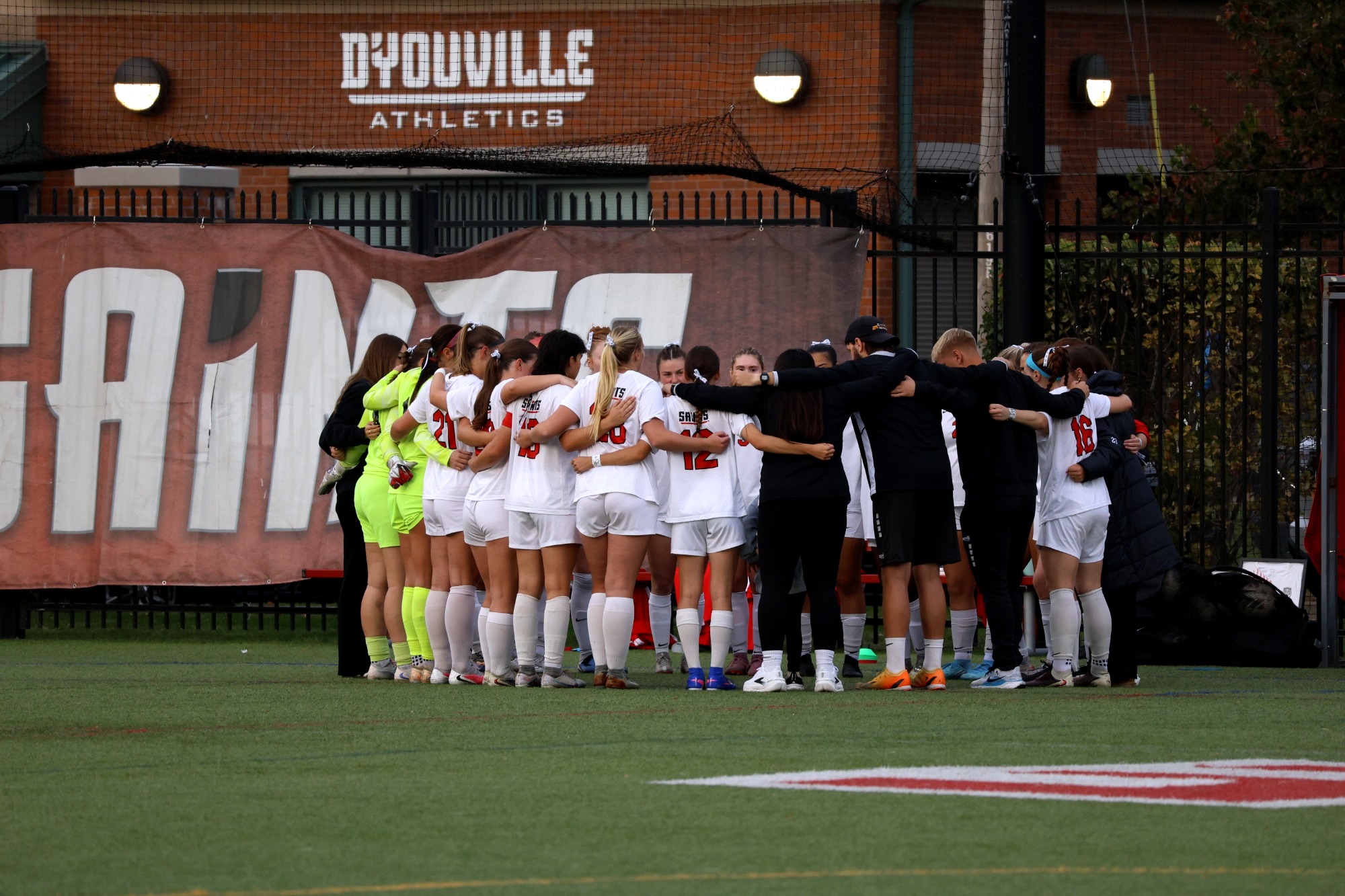 Women's Soccer Huddle Up Before a Game 