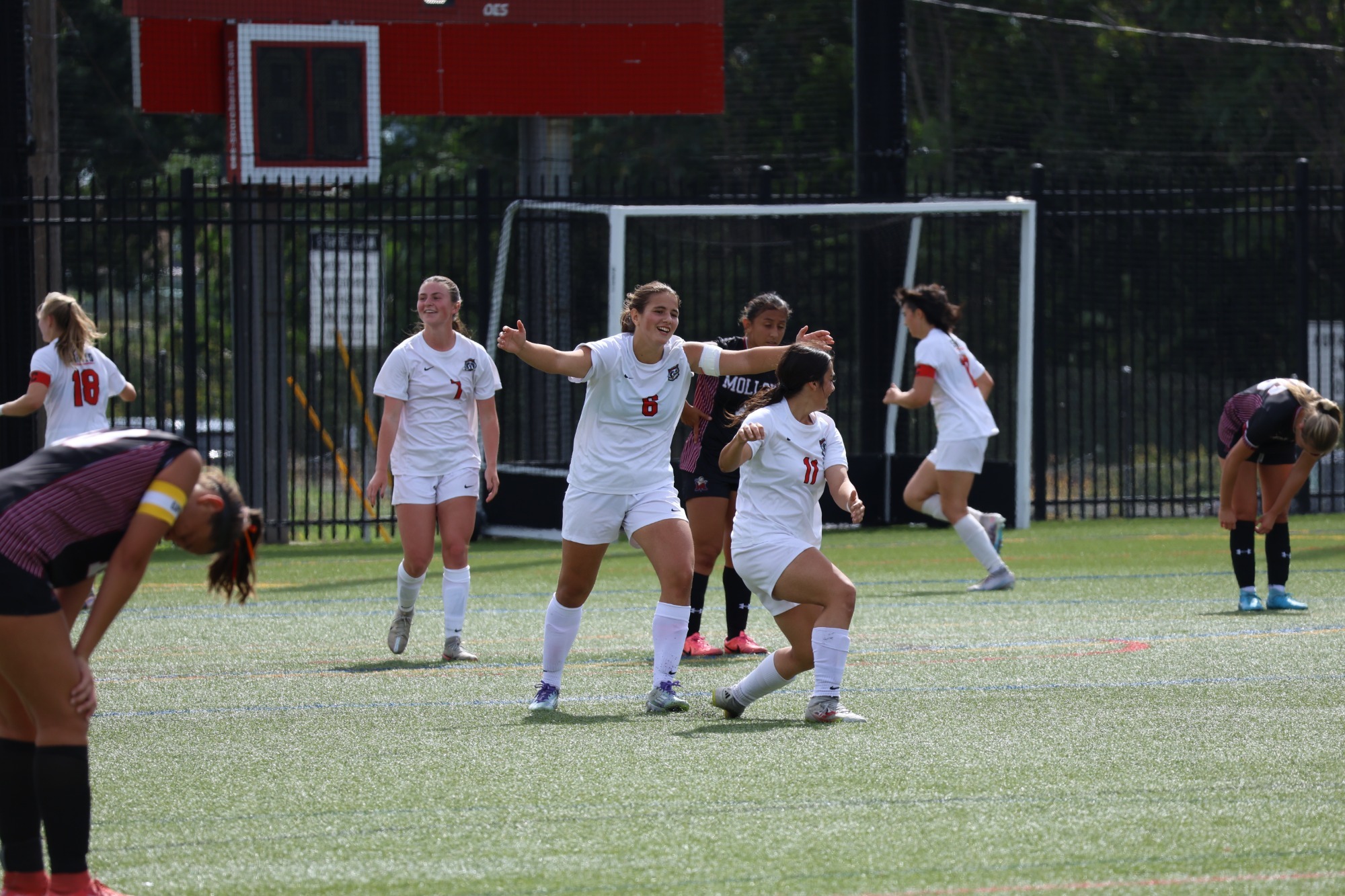 Lady Saints Soccer Celebrate Win 