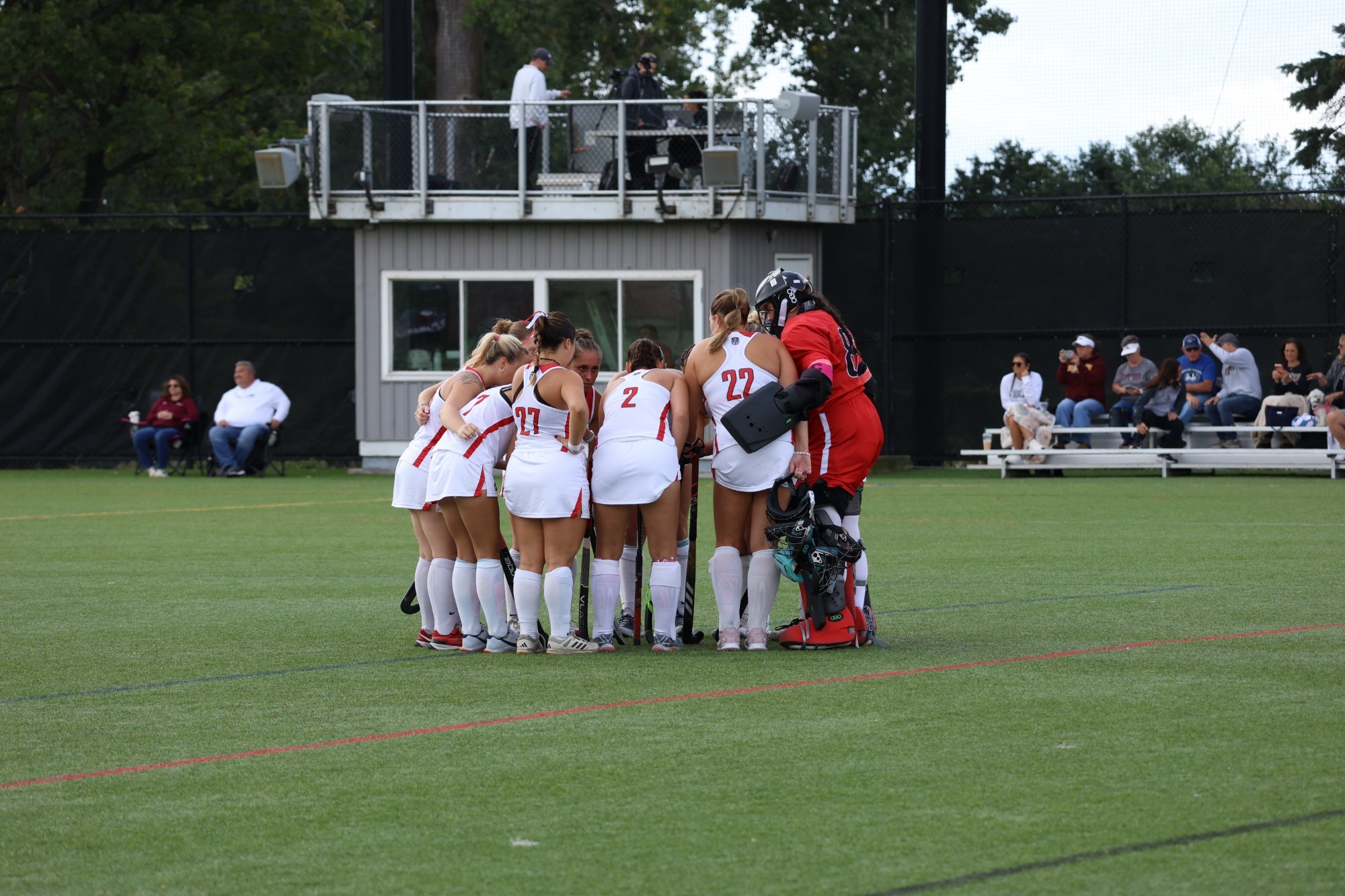 D'Youville Field Hockey Huddles Before Starting a Game