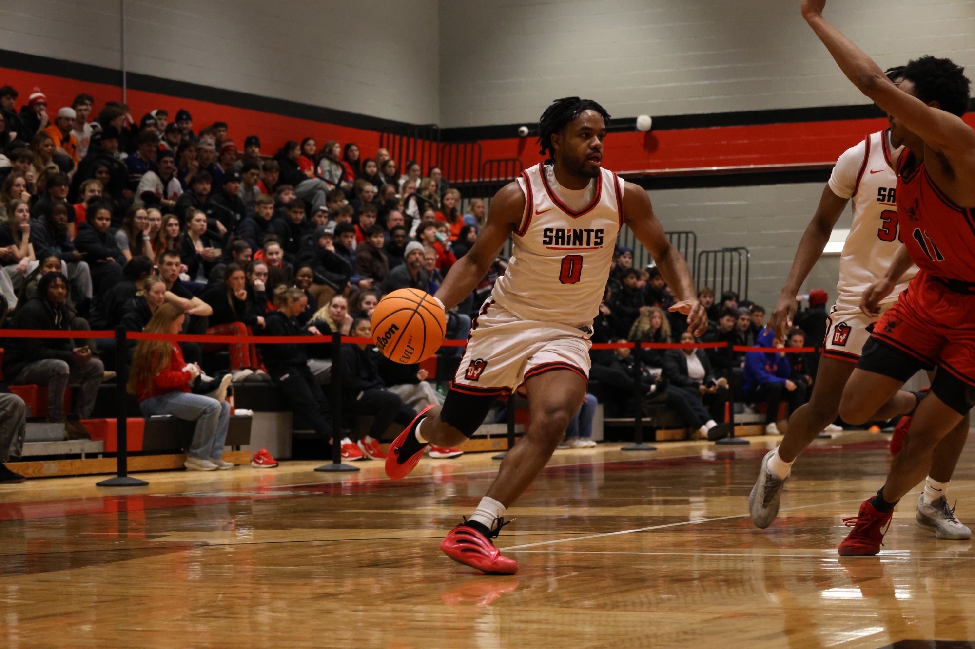 Massadila driving to the rim