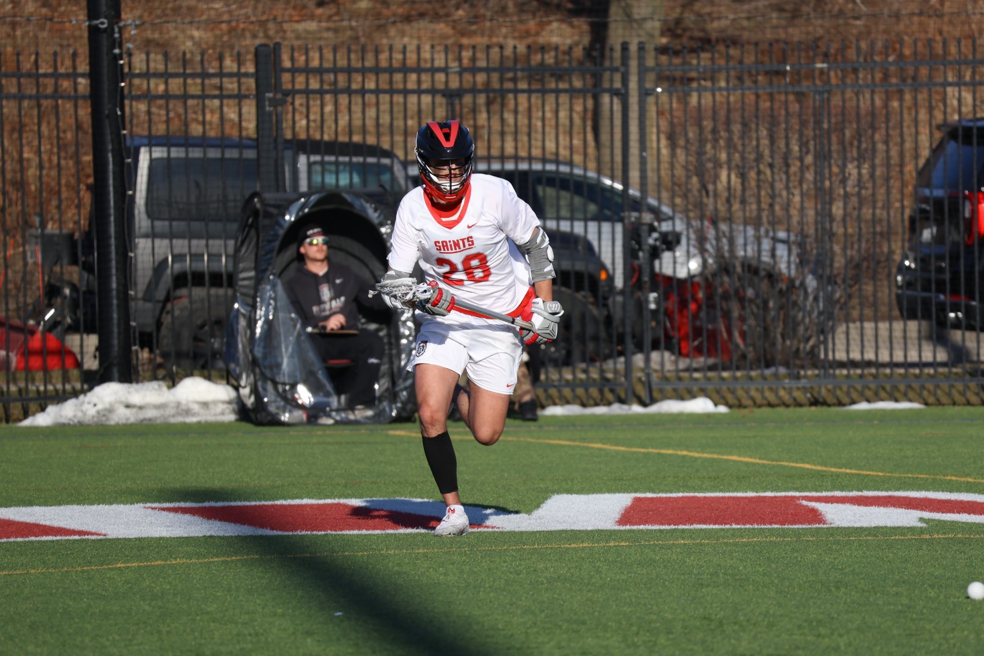 Sholett running onto the field