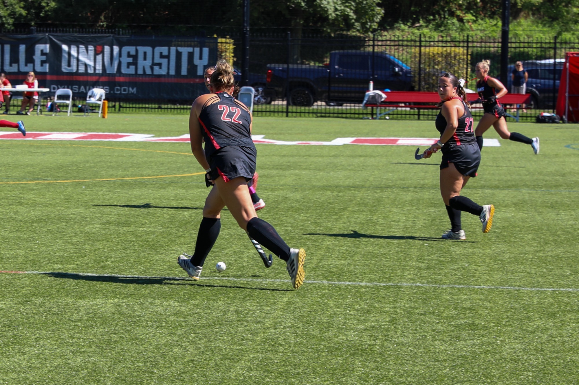Chloe Burkhard Pushes the ball upfield 