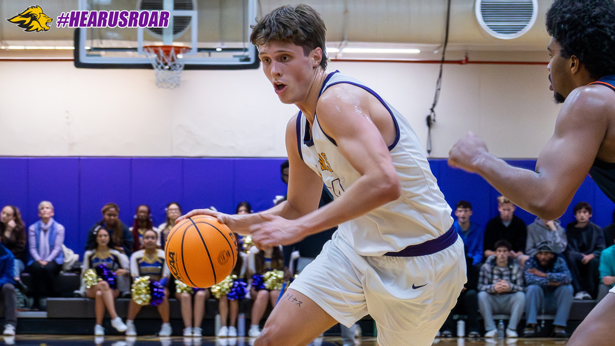 Linus Helmhold drives against WestConn