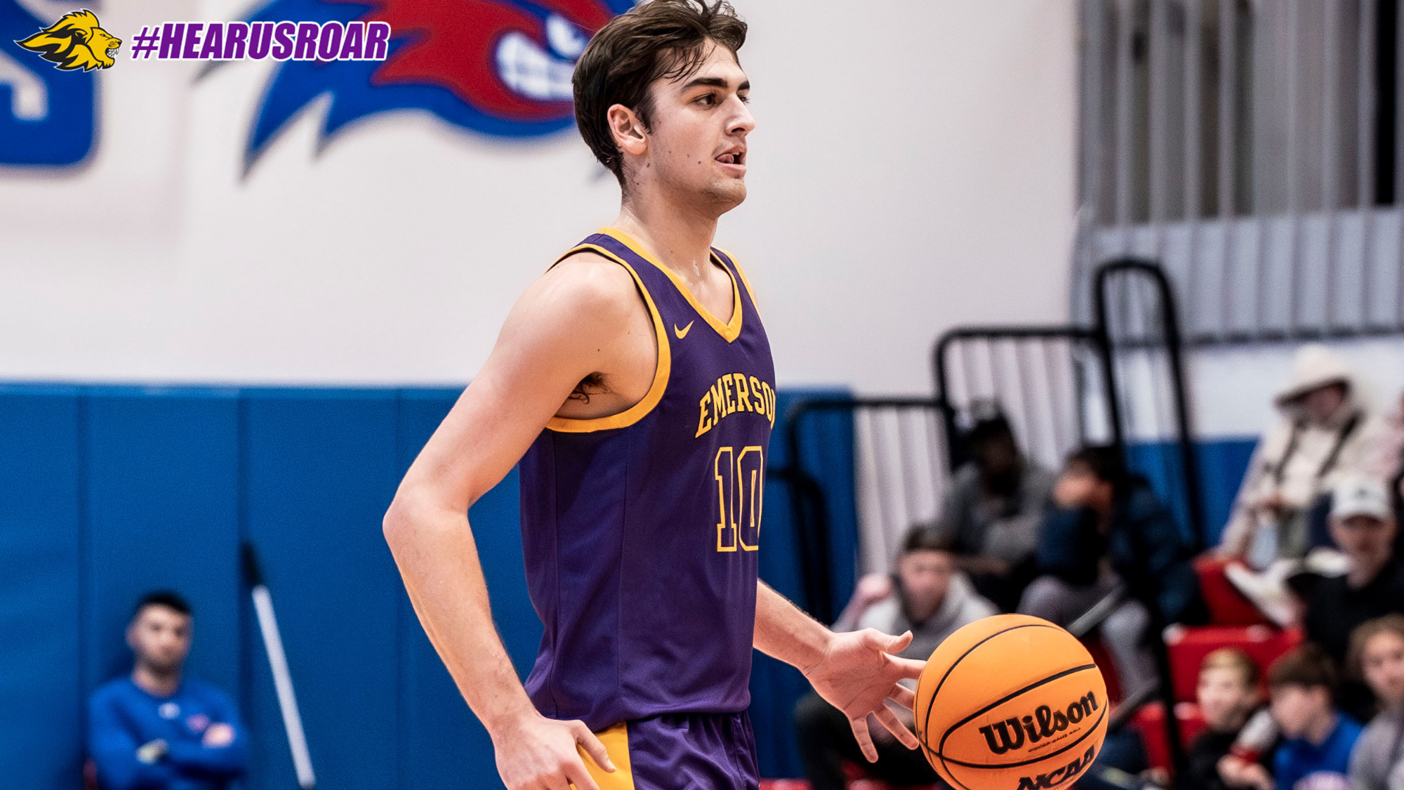 Guillermo Gasset Ruiz dribbles up court at UMass Lowell