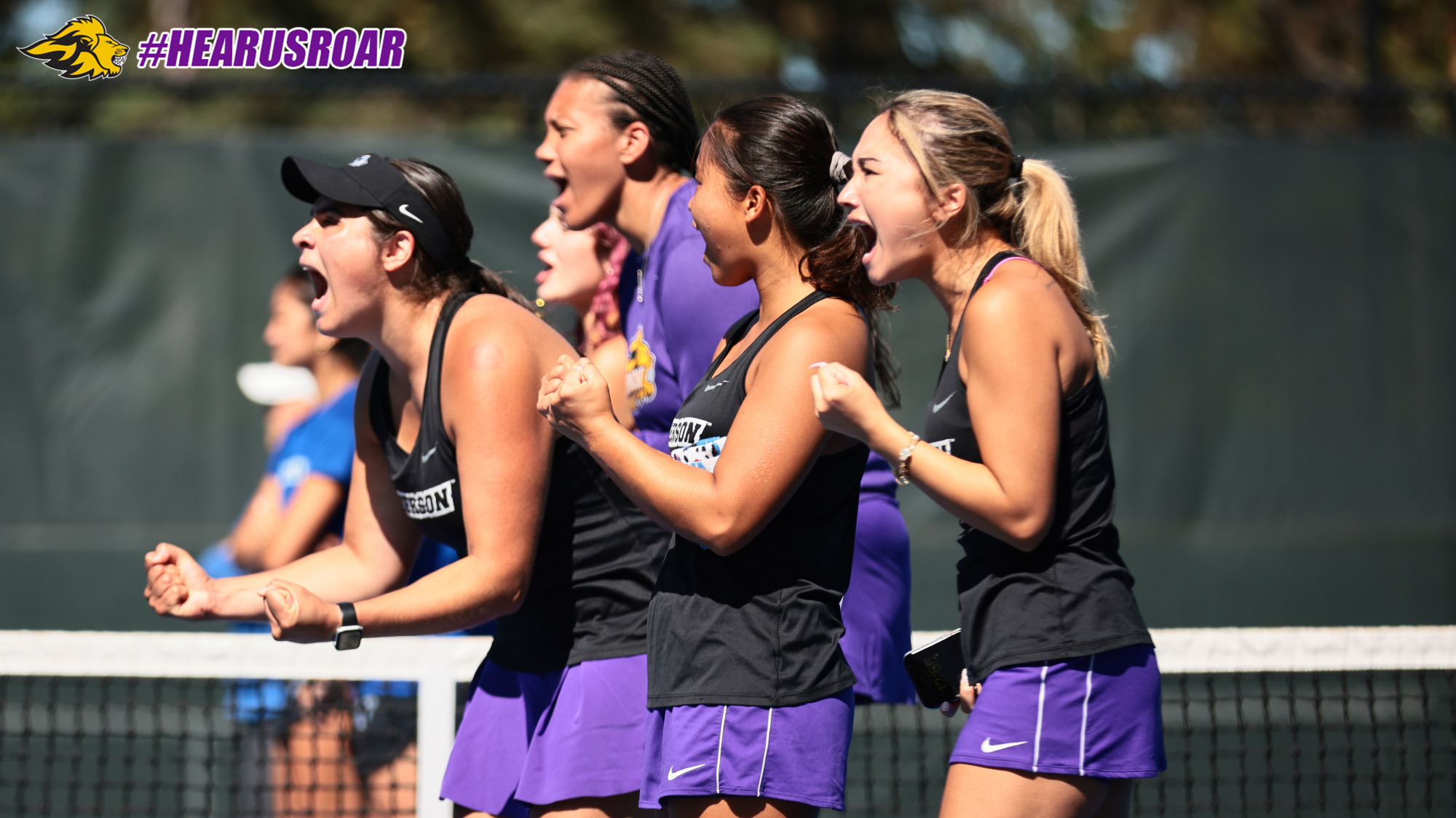 Women's Tennis celebrates a point