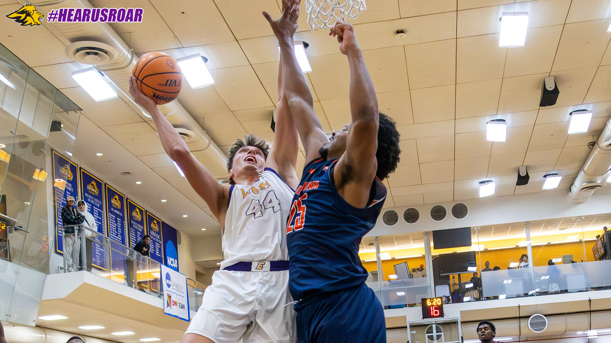 Linus Helmhold in the lane against WestConn