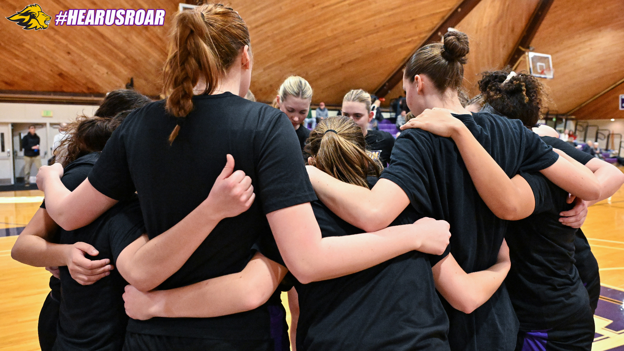 Women's Basketball huddle at Amherst