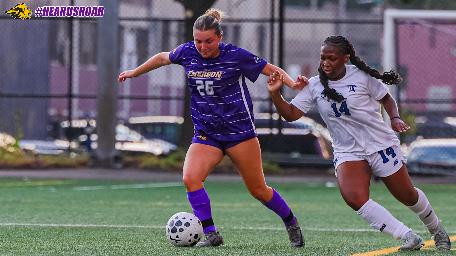 Hailey Mills pushes past a defender against UMass Boston